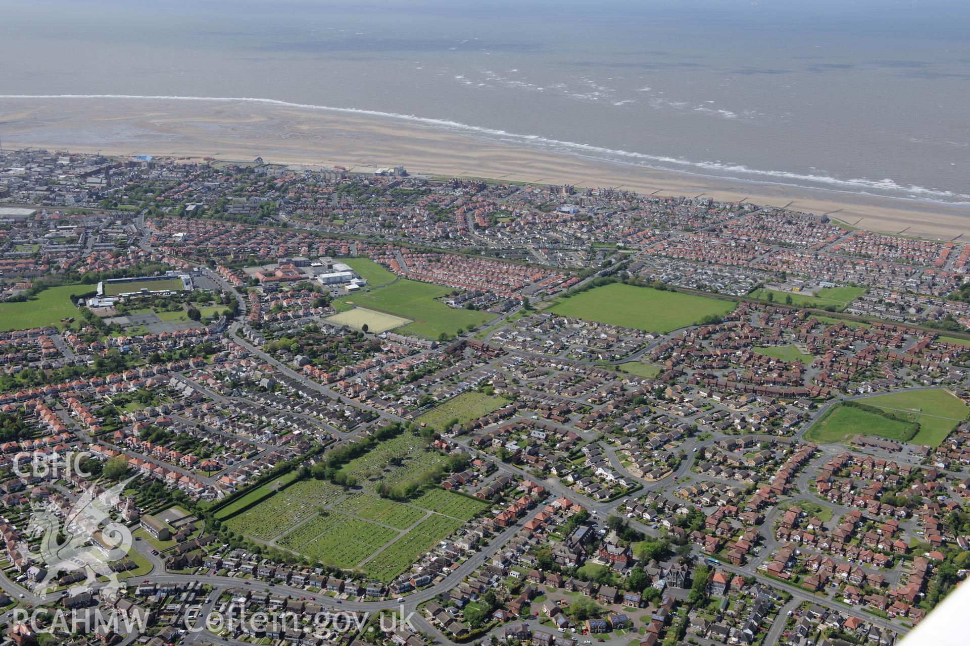 Rhyl, including view of cemetery. Oblique aerial photograph taken during the Royal Commission?s programme of archaeological aerial reconnaissance by Toby Driver on 22nd May 2013.