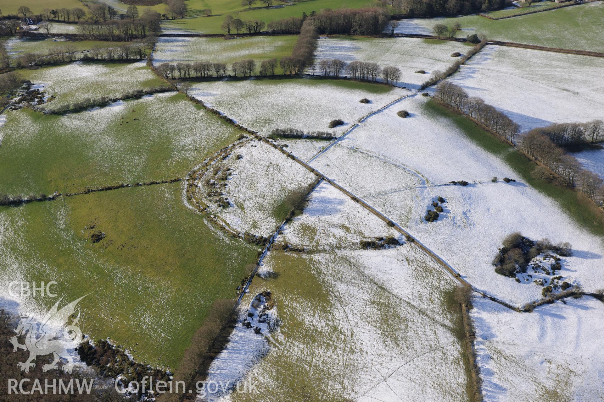 Pencoed y Foel hillfort, north east of Llandysul. Oblique aerial photograph taken during the Royal Commission's programme of archaeological aerial reconnaissance by Toby Driver on 4th February 2015.