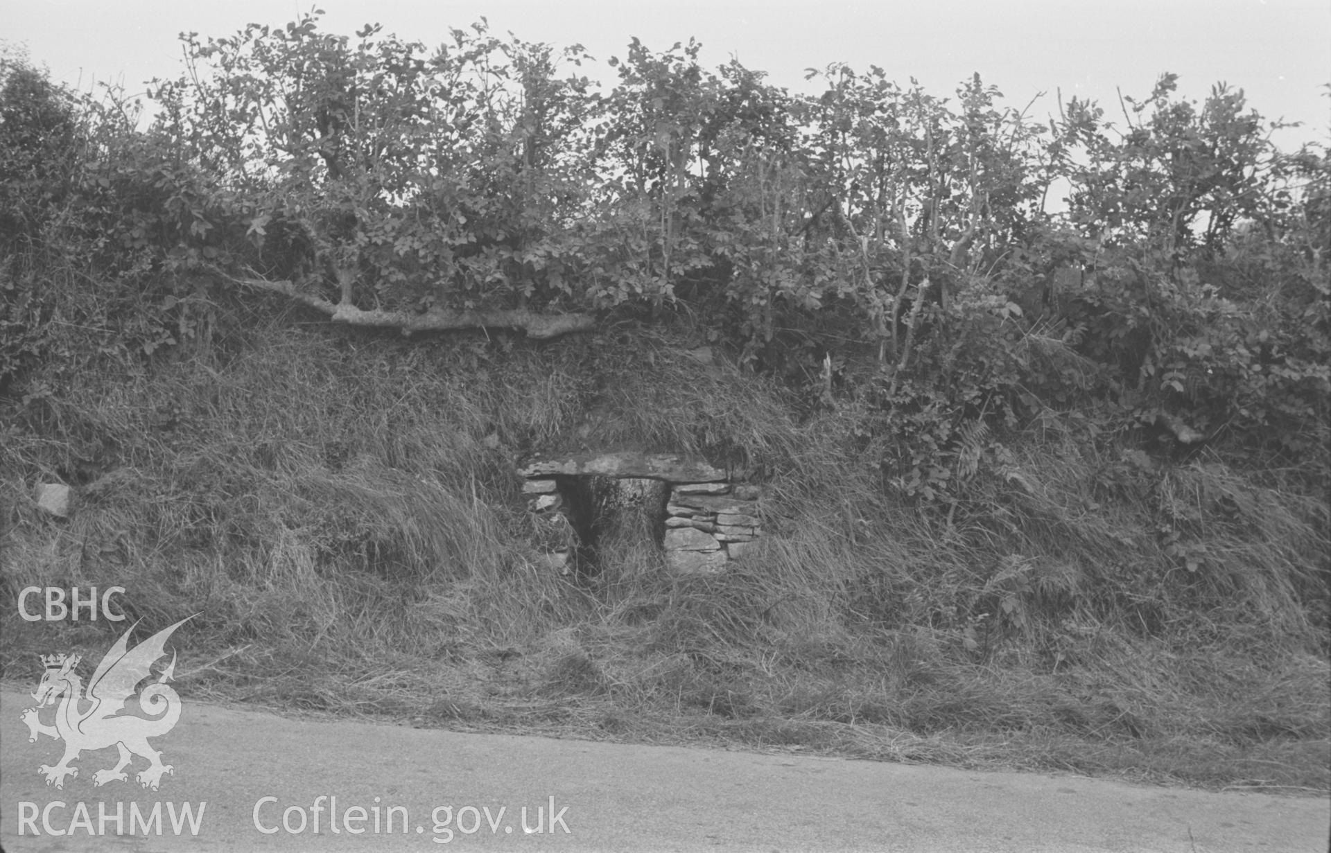 Digital copy of a black and white negative showing 'cripple hole' in field boundary on the B4337, near Trichrug. Photographed by Arthur O. Chater in September 1966.