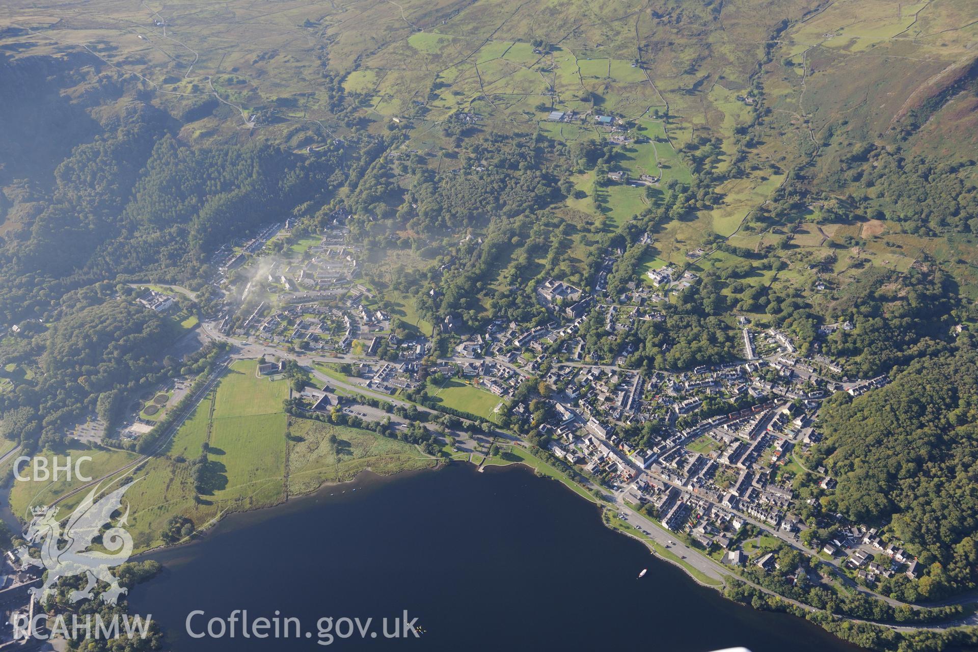 Llanberis, on the shore of Llyn Padarn and Llyn Peris. Oblique aerial photograph taken during the Royal Commission's programme of archaeological aerial reconnaissance by Toby Driver on 2nd October 2015.