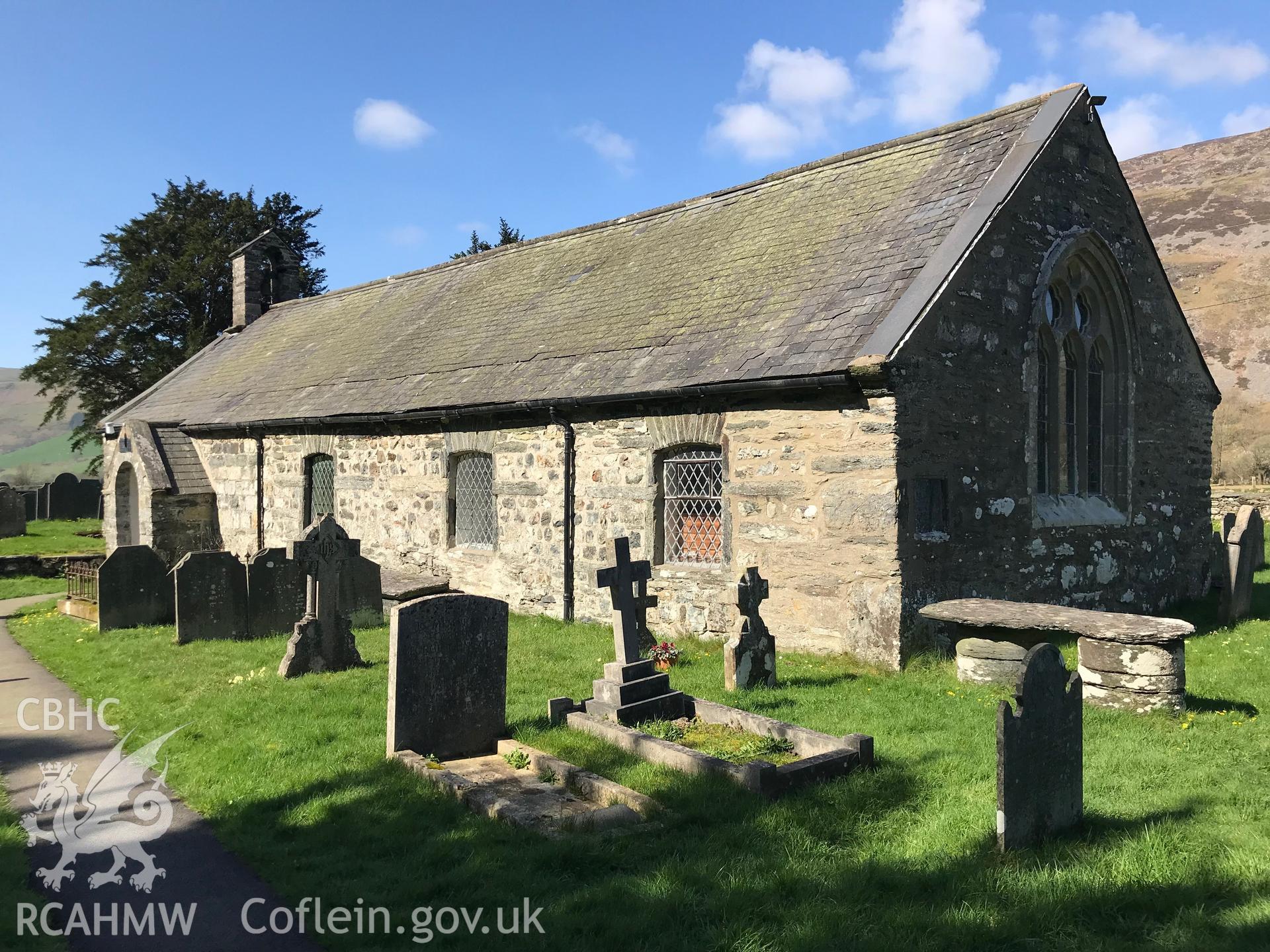 Colour photograph showing exterior view of Eglwys Mihangel (St. Michael's Church) and it's graveyard, Llanfihangel-y-Pennant, taken by Paul R. Davis on 28th March 2019.