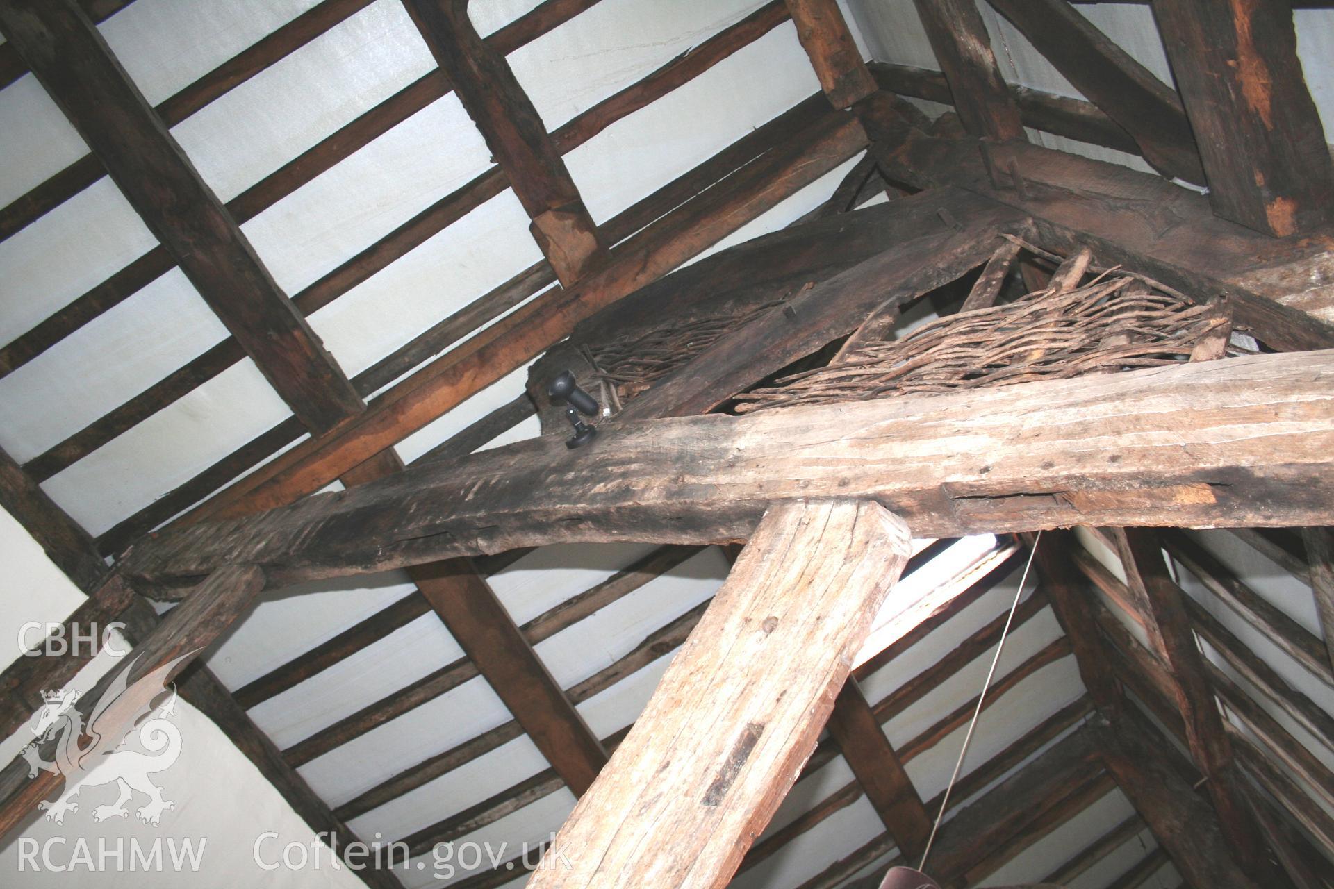 Colour photograph showing view of timber frame and ceiling beams at 27 and 31 Vale Street, Denbigh. Photographed during survey conducted by Geoff Ward on 27th March 2008.