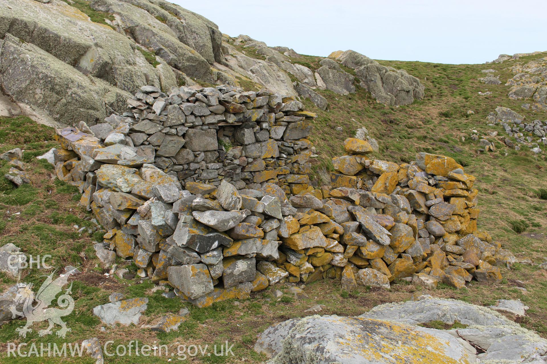 Skerries buoy keeper's cottage or stone shelter. Investigator's photographic survey for the CHERISH Project. ? Crown: CHERISH PROJECT 2018. Produced with EU funds through the Ireland Wales Co-operation Programme 2014-2020. All material made freely available through the Open Government Licence.