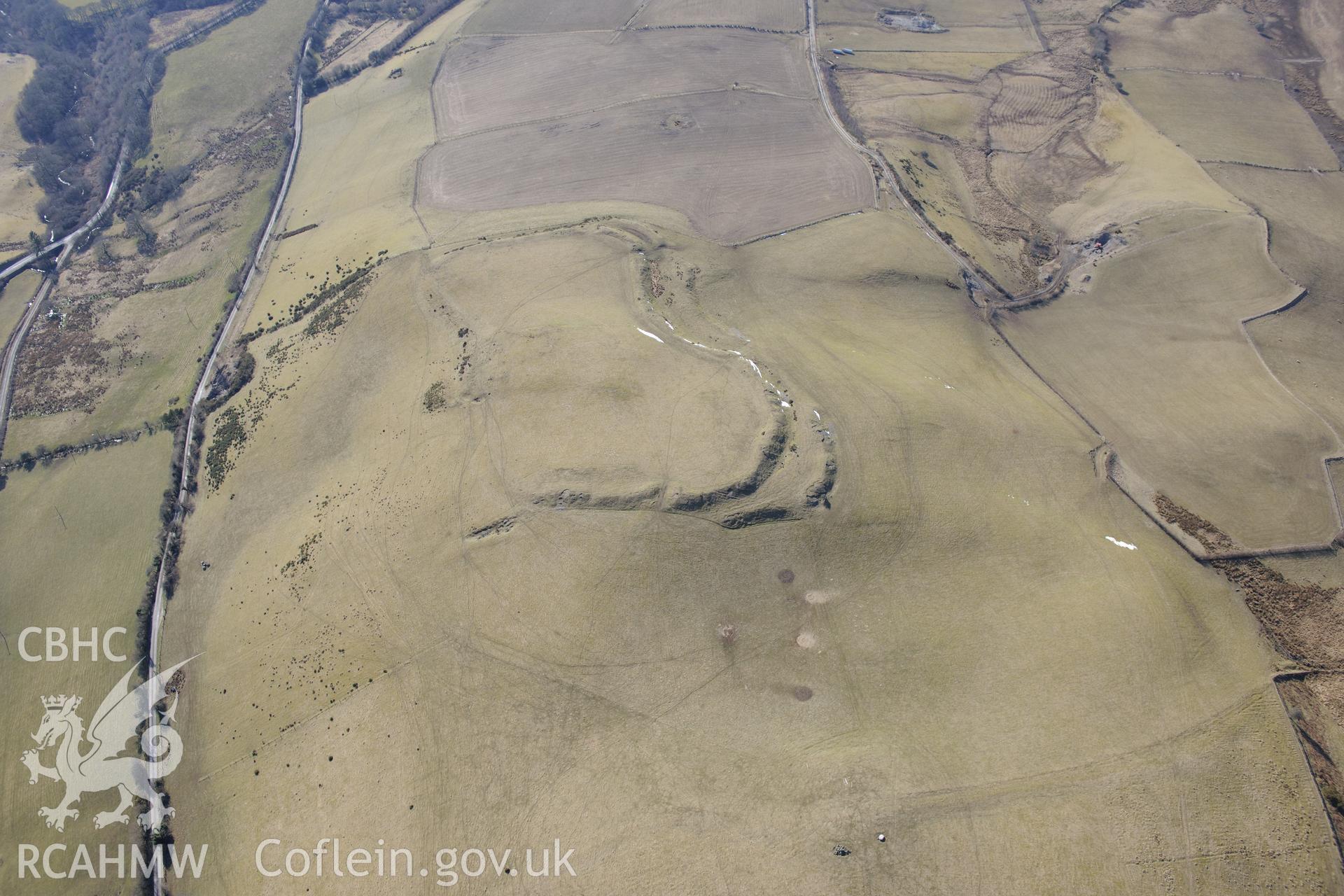 Quarts boulder at Gaer Fawr hillfort, north of Lledrod, Aberystwyth. Oblique aerial photograph taken during the Royal Commission?s programme of archaeological aerial reconnaissance by Toby Driver on 2nd April 2013.