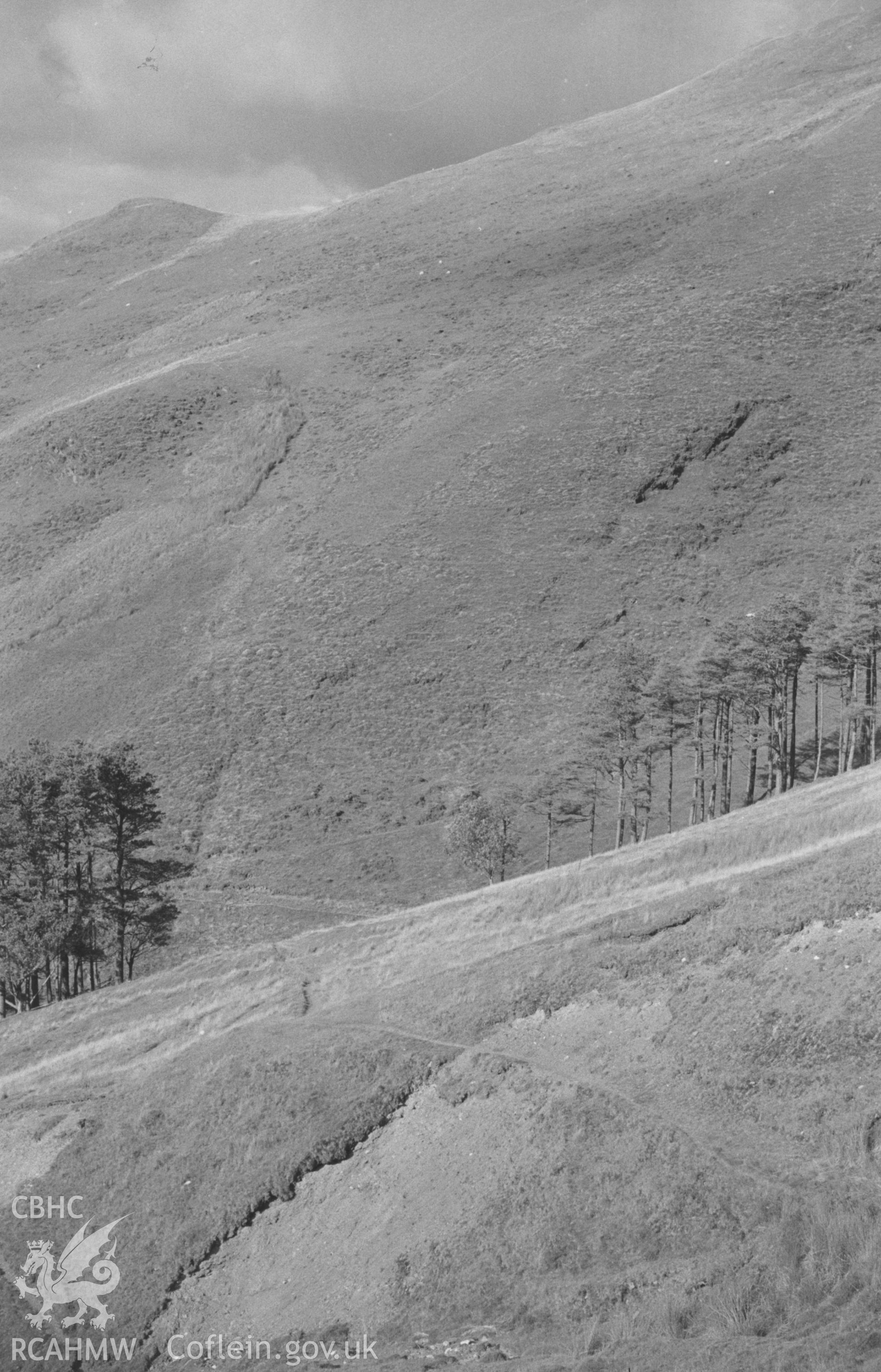 Digital copy of a black and white negative showing landscape view of Cwm Rhaiadr, south of Machynlleth. Photographed by Arthur O. Chater in September 1965.