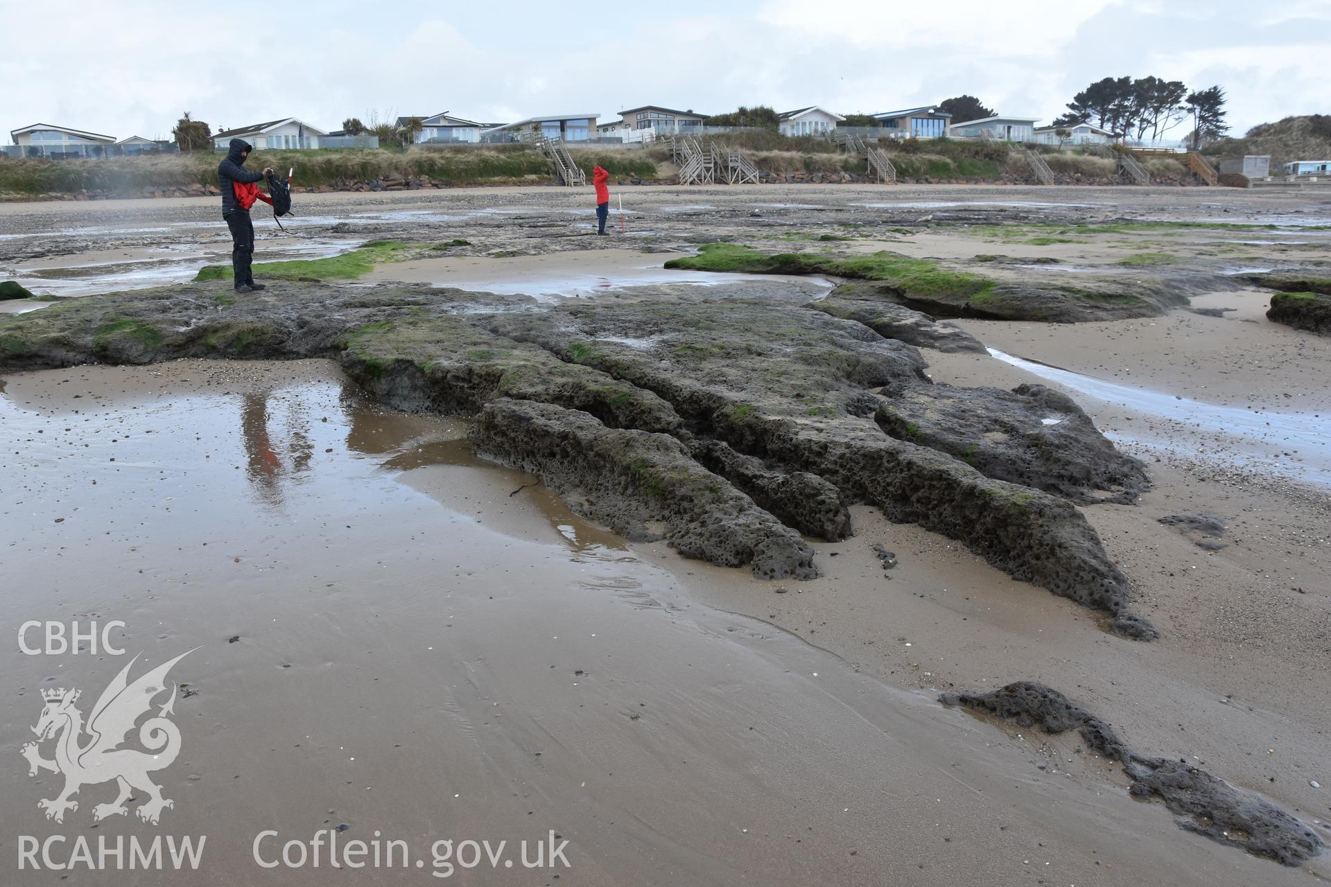 General view of peat exposures on The Warren beach, Abersoch, April 2018, including prehistoric animal footprints and later peat cuttings.Recorded with GNSS and photogrammetry for the CHERISH Project. ? Crown: CHERISH PROJECT 2018. Produced with EU funds through the Ireland Wales Co-operation Programme 2014-2020. All material made freely available through the Open Government Licence.