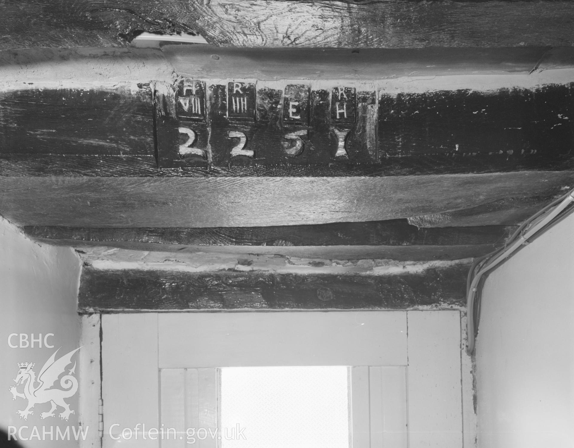 Digital copy of an acetate negative showing carved date above main doorway at Erwfaethlon, Merioneth,