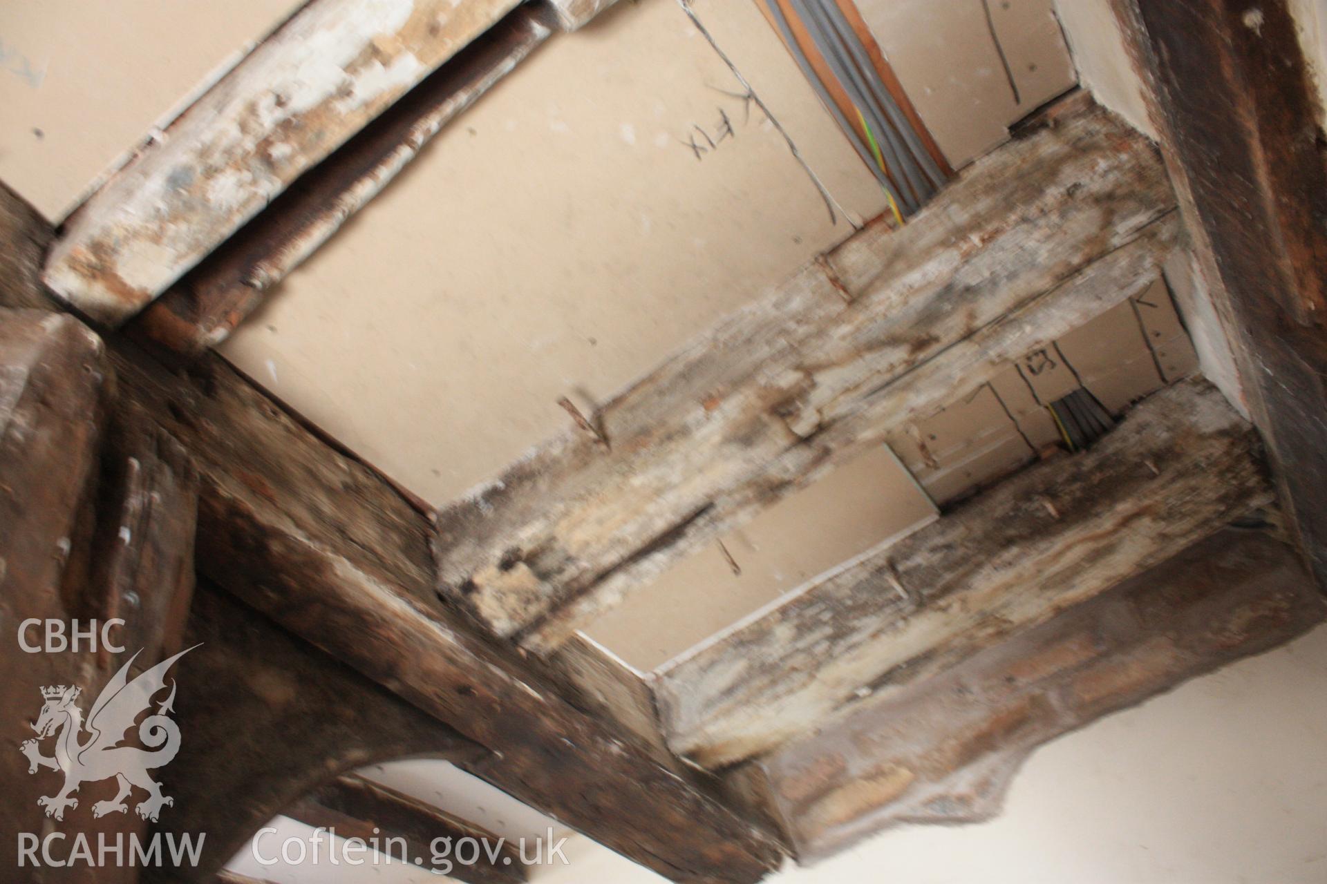 Colour photograph of internal timber frame and ceiling beams at Porth-y-Dwr, 67 Clwyd Street, Ruthin. Photographed during survey conducted by Geoff Ward on 10th June 2013.