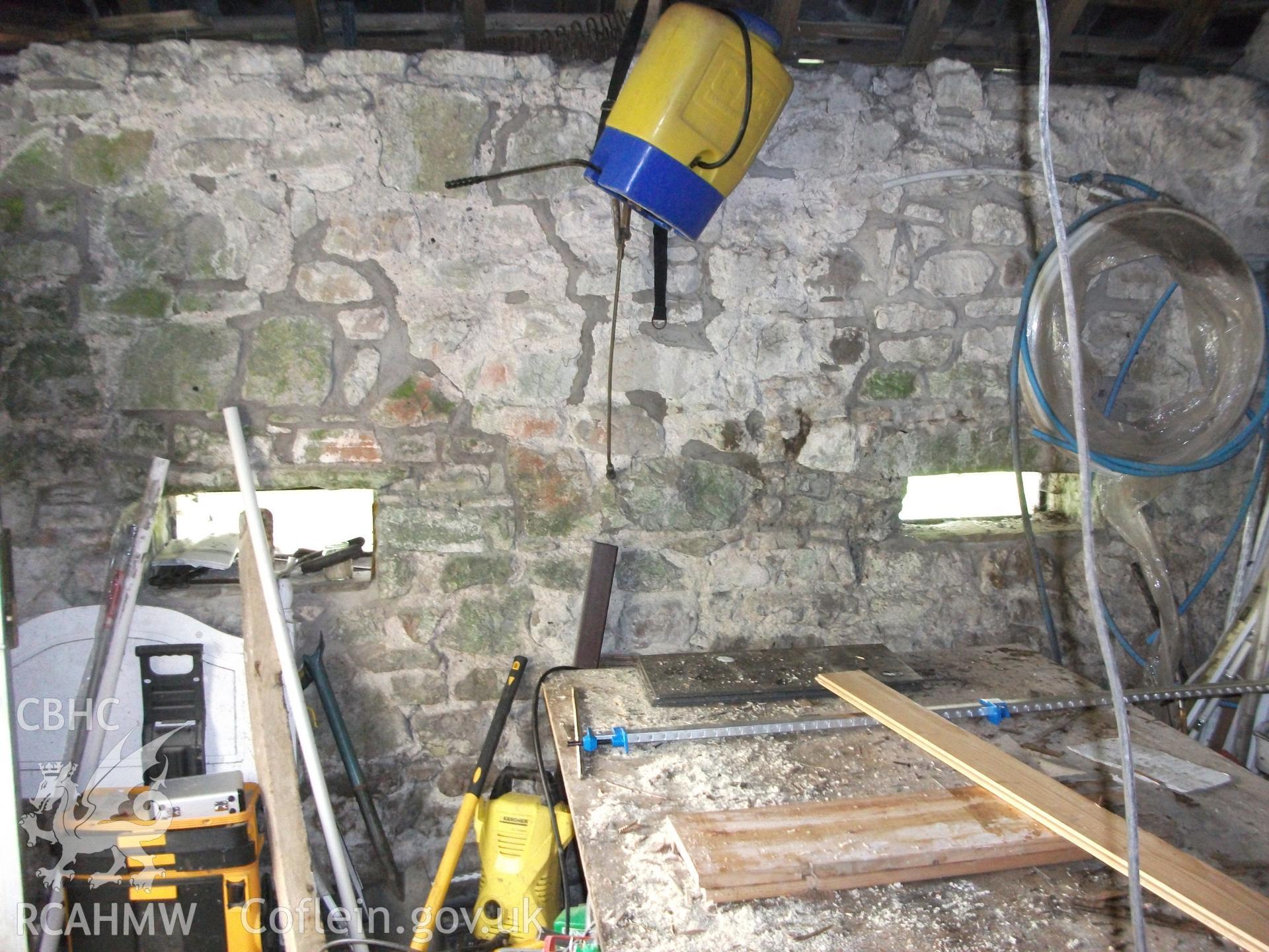 Photograph showing detailed view of the interior of the building attached to the cottage at Pant-y-Castell, Maesybont. Photographed by Mark Waghorn to meet a condition attached to planning application.