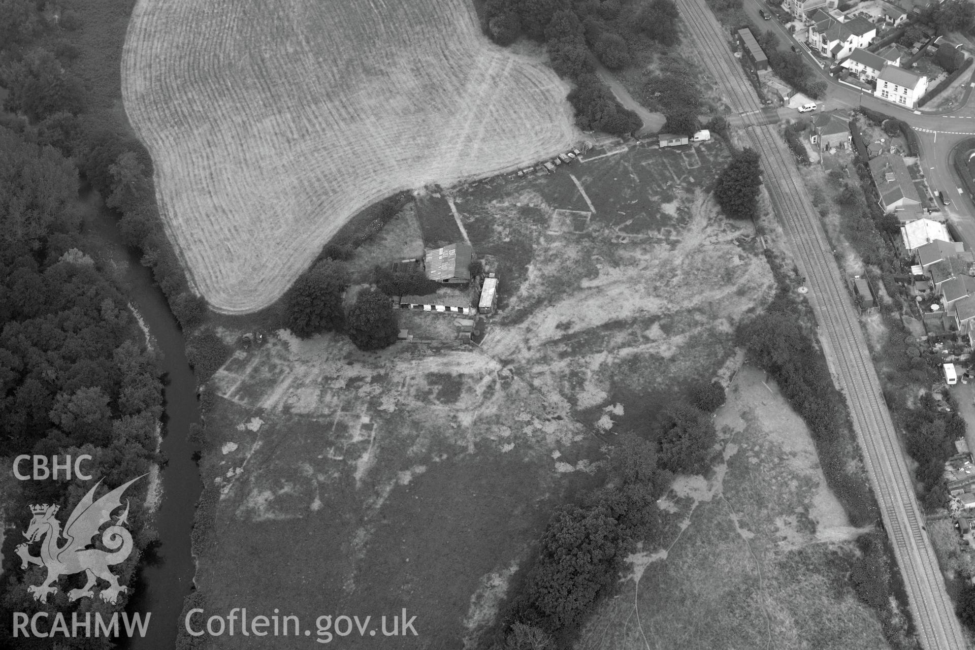 Royal Commission aerial photography of Pont hir tinworks with extensive parchmarks revealing buried structures, taken during drought conditions on 22nd July 2013.