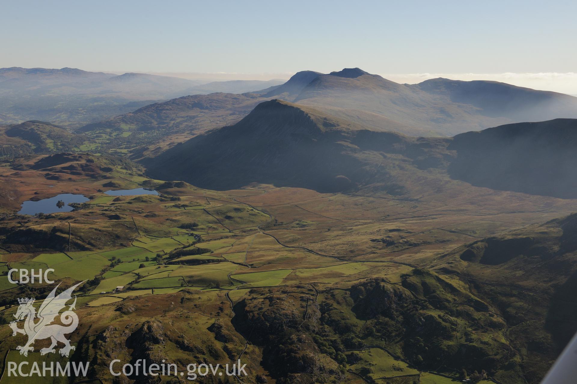 Cadair Idris and Llynnau Cregennen. Oblique aerial photograph taken during the Royal Commission's programme of archaeological aerial reconnaissance by Toby Driver on 2nd October 2015.