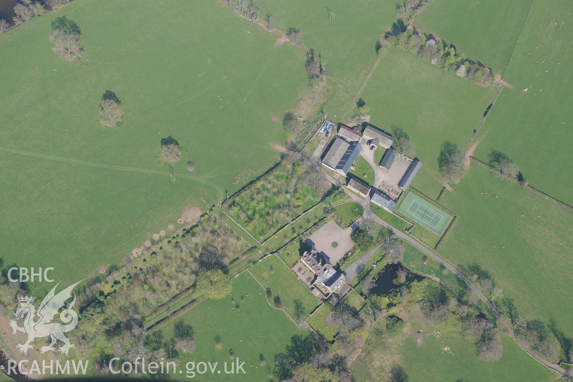 Abercynrig, including it's garden, outbuildings and malt house. Oblique aerial photograph taken during the Royal Commission's programme of archaeological aerial reconnaissance by Toby Driver on 21st April 2015