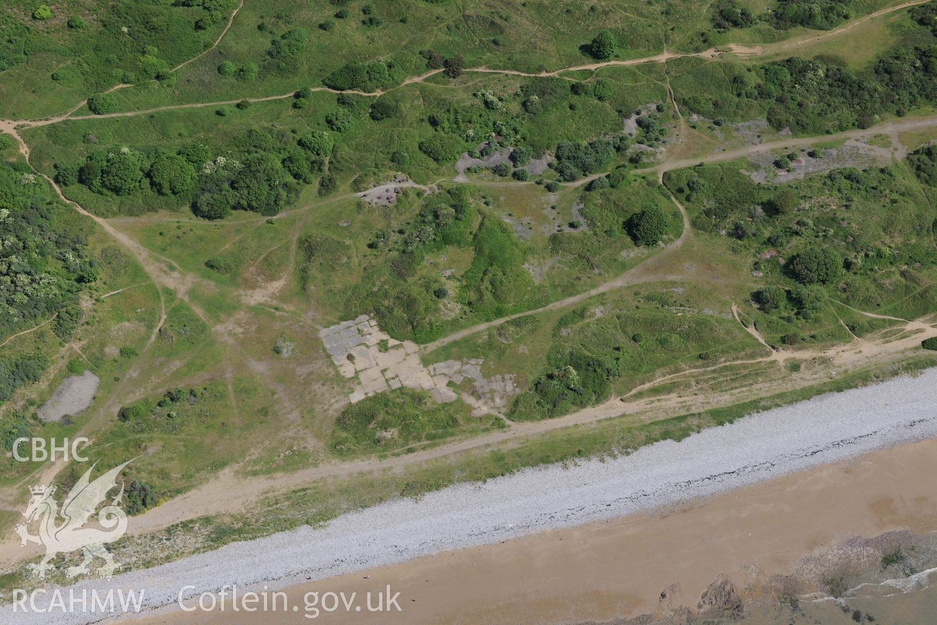 Merthyr Mawr Warren and three rifle mounds at Wig Fach Rifle Range. Oblique aerial photograph taken during the Royal Commission's programme of archaeological aerial reconnaissance by Toby Driver on 19th June 2015.