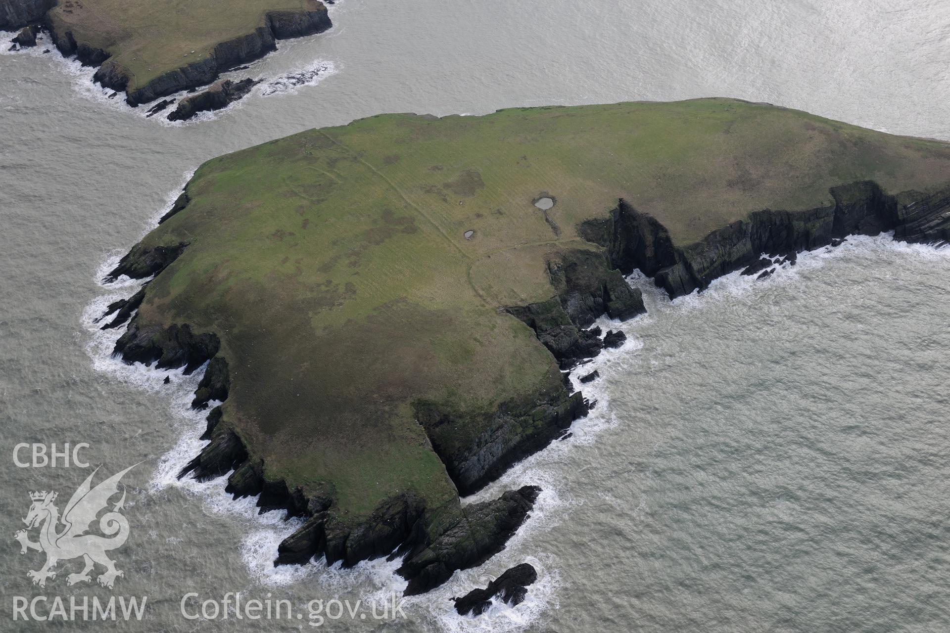 Cardigan Island. From a set of oblique aerial orbital photographs taken for "structure from motion" processing during the Royal Commission's programme of archaeological aerial reconnaissance by Toby Driver on 13th March 2015.