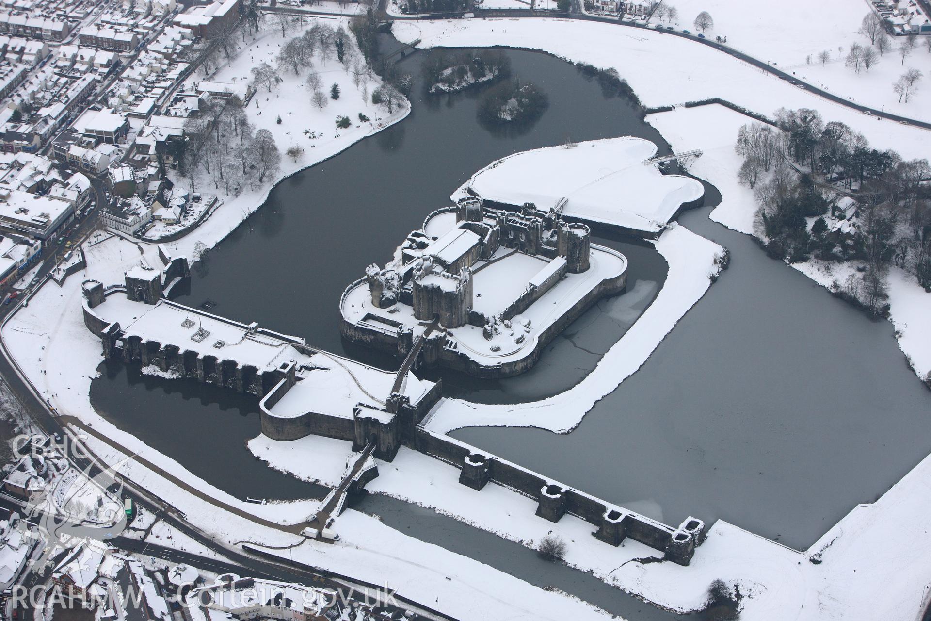 Caerphilly Castle. Oblique aerial photograph taken during the Royal Commission?s programme of archaeological aerial reconnaissance by Toby Driver on 24th January 2013.