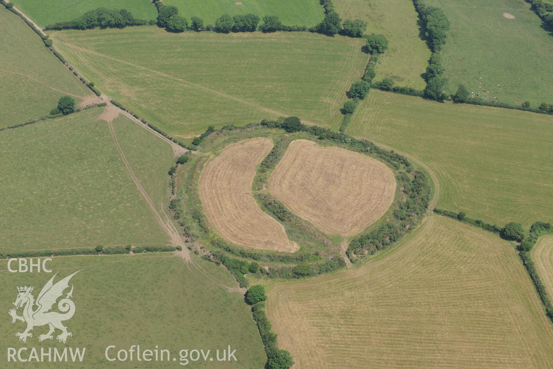 Castell Mawr henge or hillfort, Meline, south west of Cardigan. Oblique aerial photograph taken during the Royal Commission?s programme of archaeological aerial reconnaissance by Toby Driver on 12th July 2013.