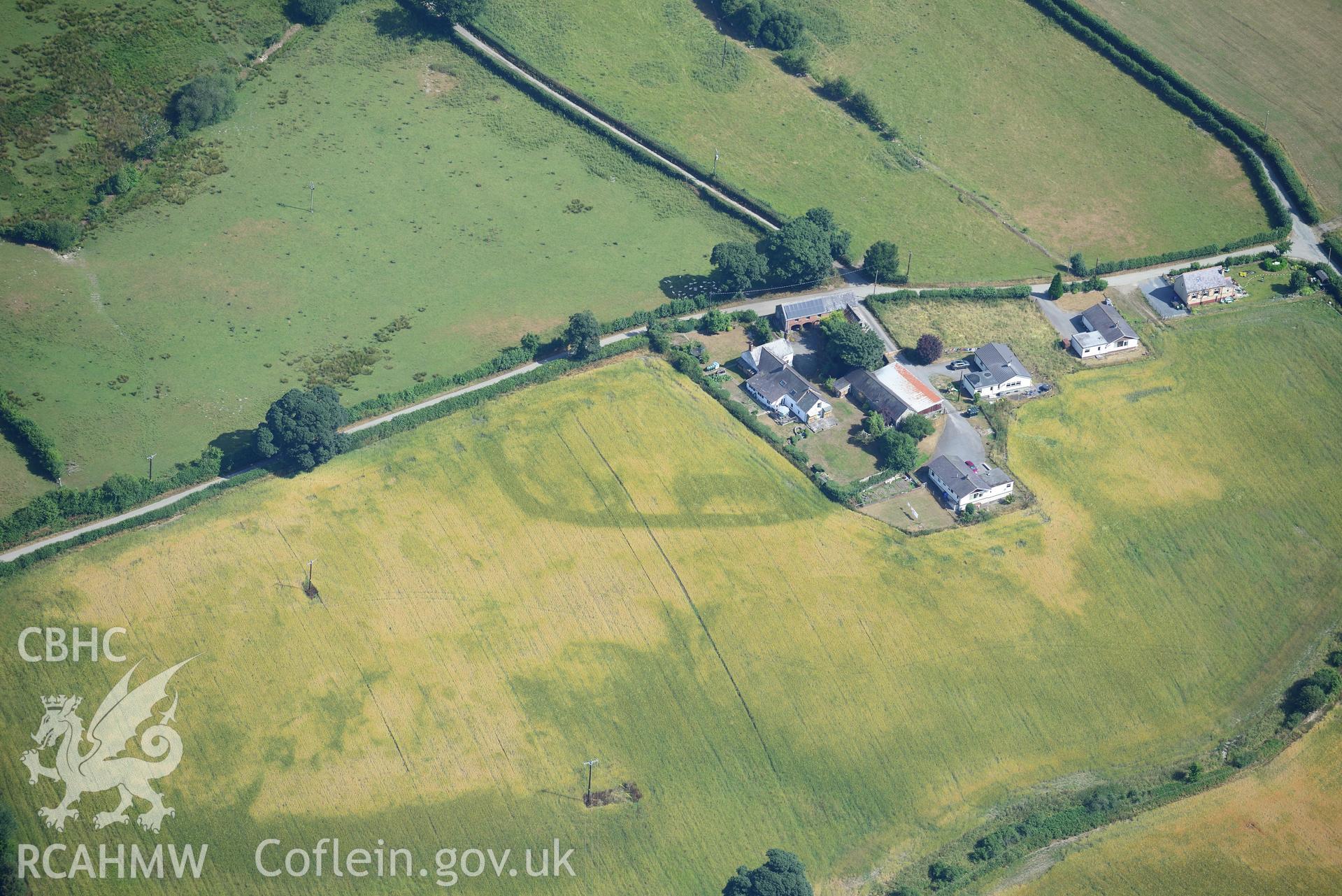 Royal Commission aerial photography of Plas Adda defended enclosure cropmarks taken on 19th July 2018 during the 2018 drought.
