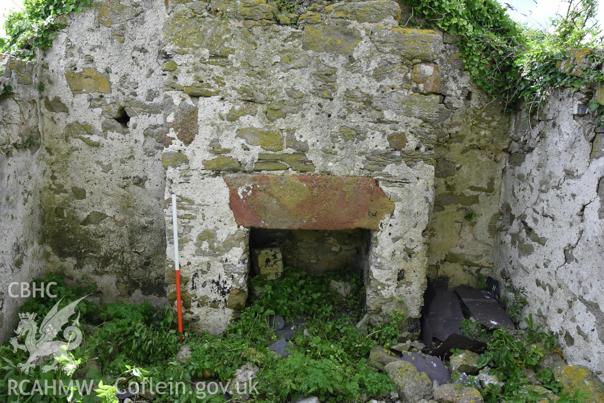Investigator's photographic survey of the church on Puffin Island or Ynys Seiriol for the CHERISH Project. View showing the post medieval cottage on the south side of the tower, occupying the former transept of the church. ? Crown: CHERISH PROJECT 2018. Produced with EU funds through the Ireland Wales Co-operation Programme 2014-2020. All material made freely available through the Open Government Licence.