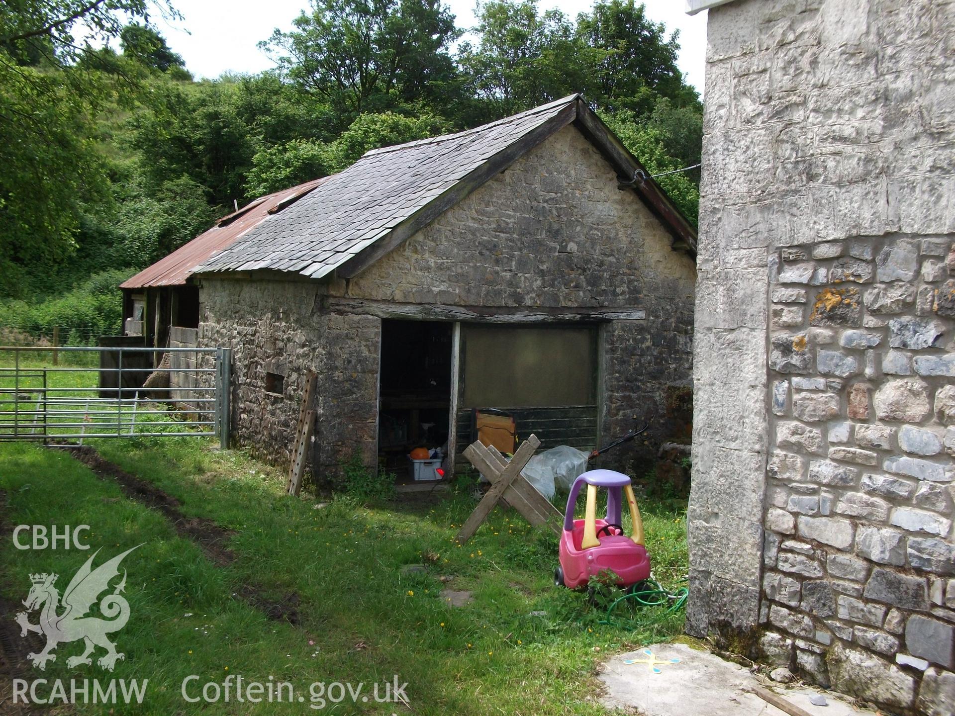 Photograph showing rear of building attached to the cottage and rear and side elevation of building adjacent to the cottage at Pant-y-Castell, Maesybont. Photographed by Mark Waghorn to meet a condition attached to planning application.