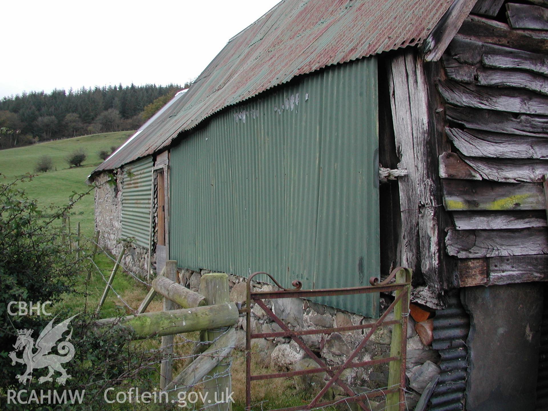 Exterior view of barn or shed with wooden panelling and corrugated iron roof and wall at Pistyll Gwyn Farmstead. Photographic survey of Pistyll Gwyn Farmstead conducted by Geoff Ward on 13th November 2007.