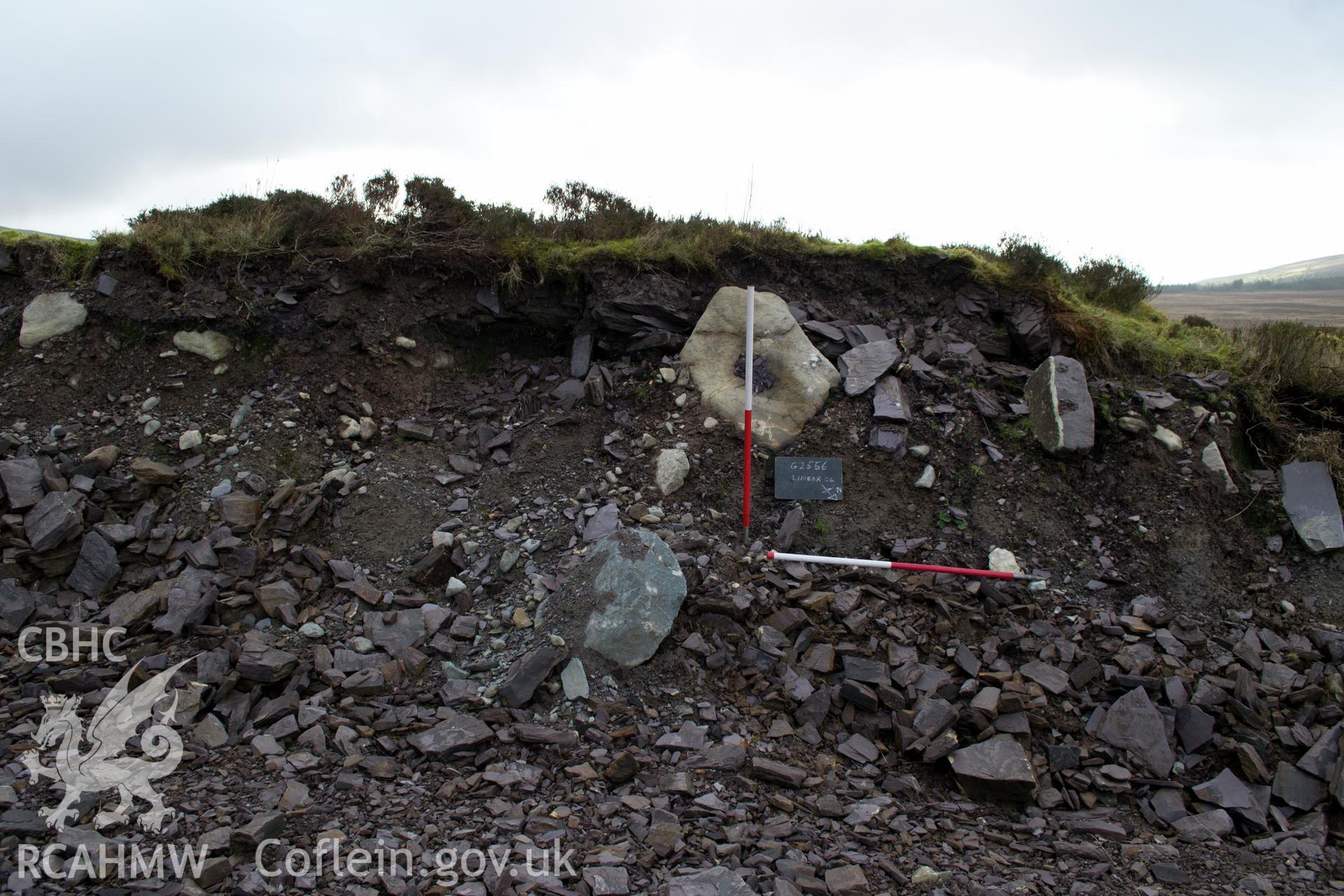 View from the north north east 'of section cut by haul road of linear 04.' Photographed by Gwynedd Archaeological Trust as part of walkover survey of Penrhyn Quarry, Bethesda, on 20th February 2018. Project no. G2556.