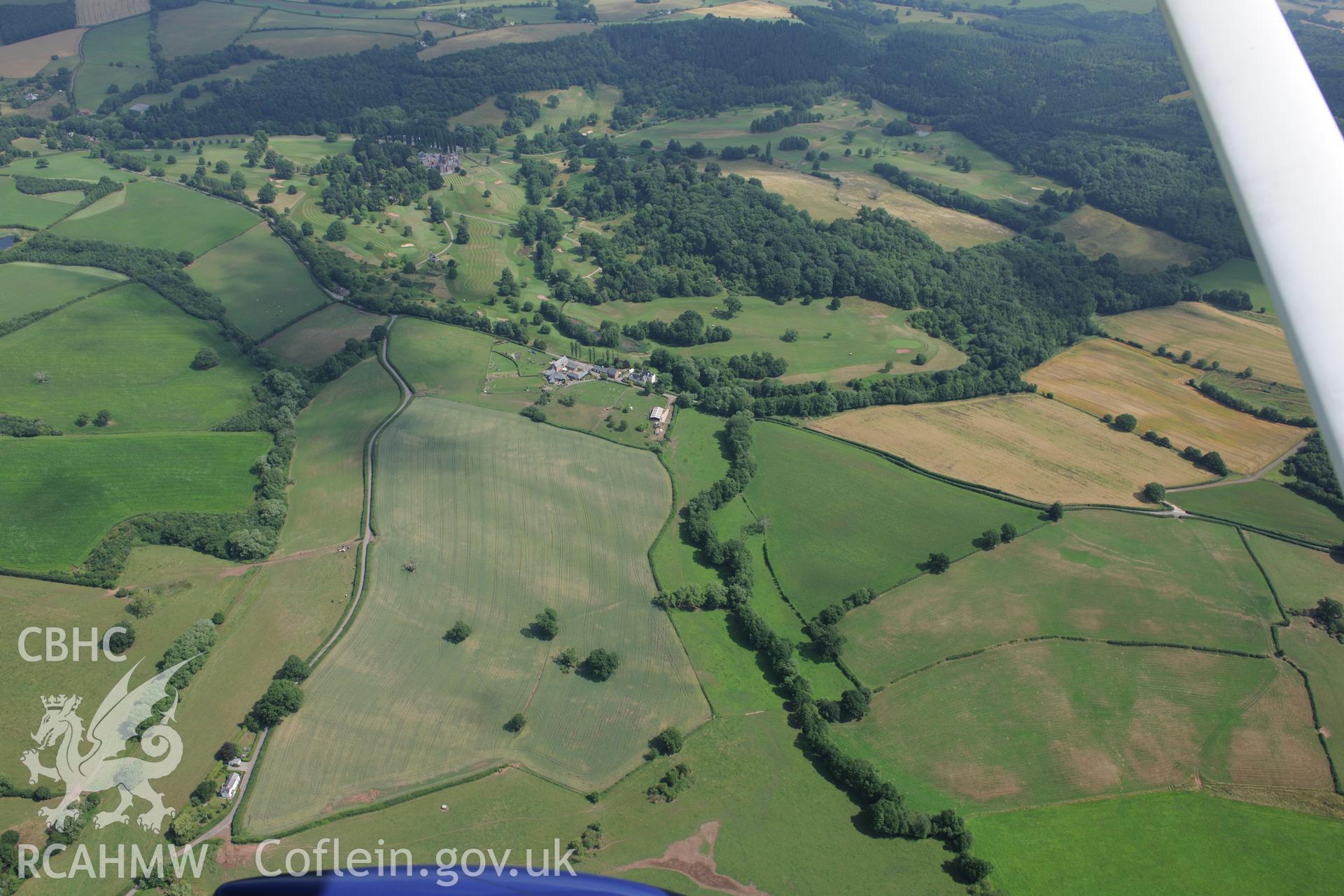 Grace Dieu Cistercian Abbey and the site of a post-medieval house at Abbey Meadow, west of Monmouth. Oblique aerial photograph taken during the Royal Commission?s programme of archaeological aerial reconnaissance by Toby Driver on 1st August 2013.