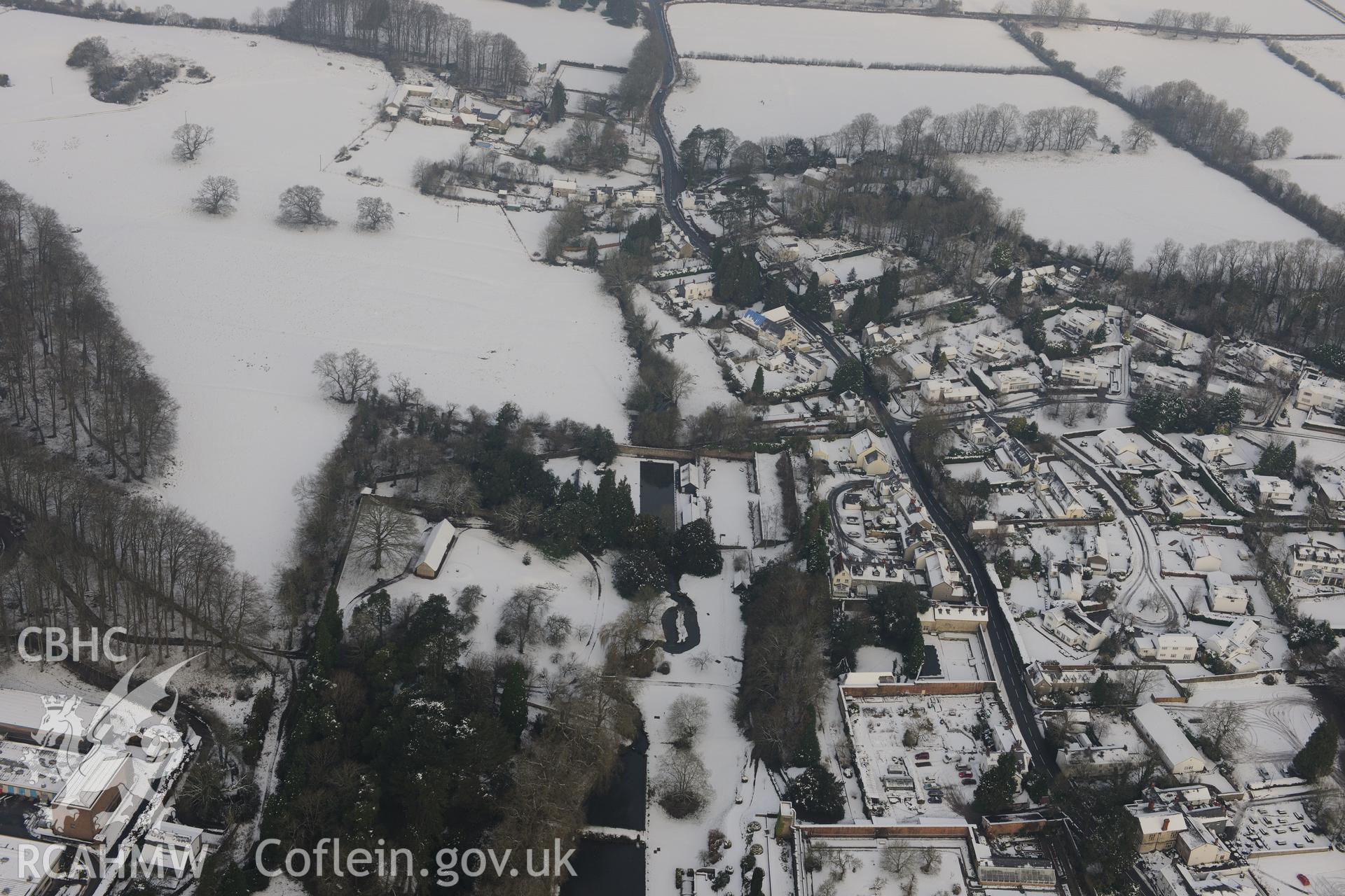 The village of St Fagans and St Fagans Mueseum of Welsh Life. Oblique aerial photograph taken during the Royal Commission?s programme of archaeological aerial reconnaissance by Toby Driver on 24th January 2013.