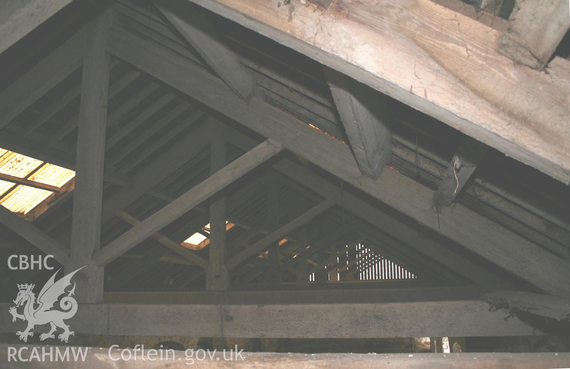Interior view showing wooden roof beams and joists. Photographic survey of the threshing house, straw house, mixing house and root house at Tan-y-Graig Farm, Llanfarian, conducted by Geoff Ward and John Wiles, 11th December 2006.