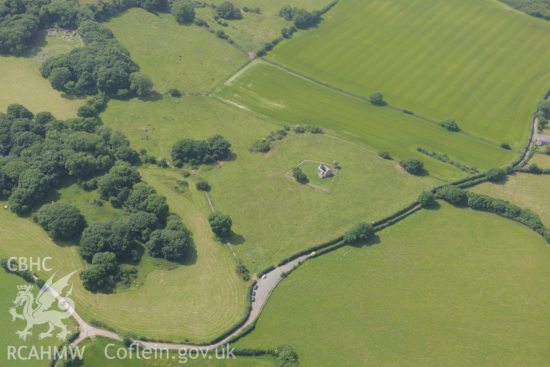 Capel Lligwy chapel of ease, inland of Moelfre, Anglesey. Oblique aerial photograph taken during the Royal Commission?s programme of archaeological aerial reconnaissance by Toby Driver on  12th July 2013.