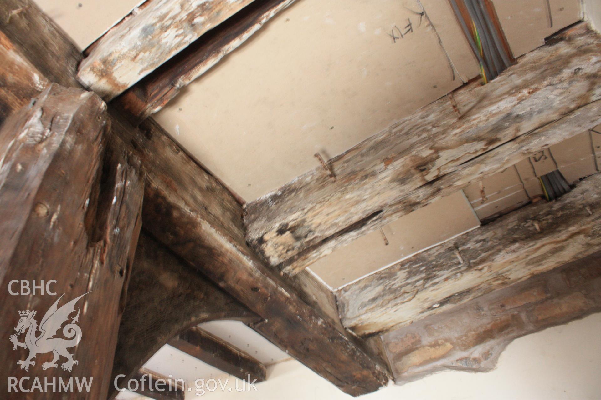 Colour photograph of internal timber frame and ceiling beams at Porth-y-Dwr, 67 Clwyd Street, Ruthin. Photographed during survey conducted by Geoff Ward on 10th June 2013.