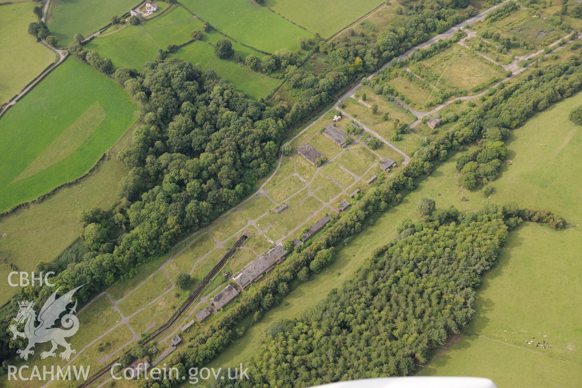 Valley works, Rhydymwyn, Mold. Oblique aerial photograph taken during the Royal Commission's programme of archaeological aerial reconnaissance by Toby Driver on 11th September 2015.