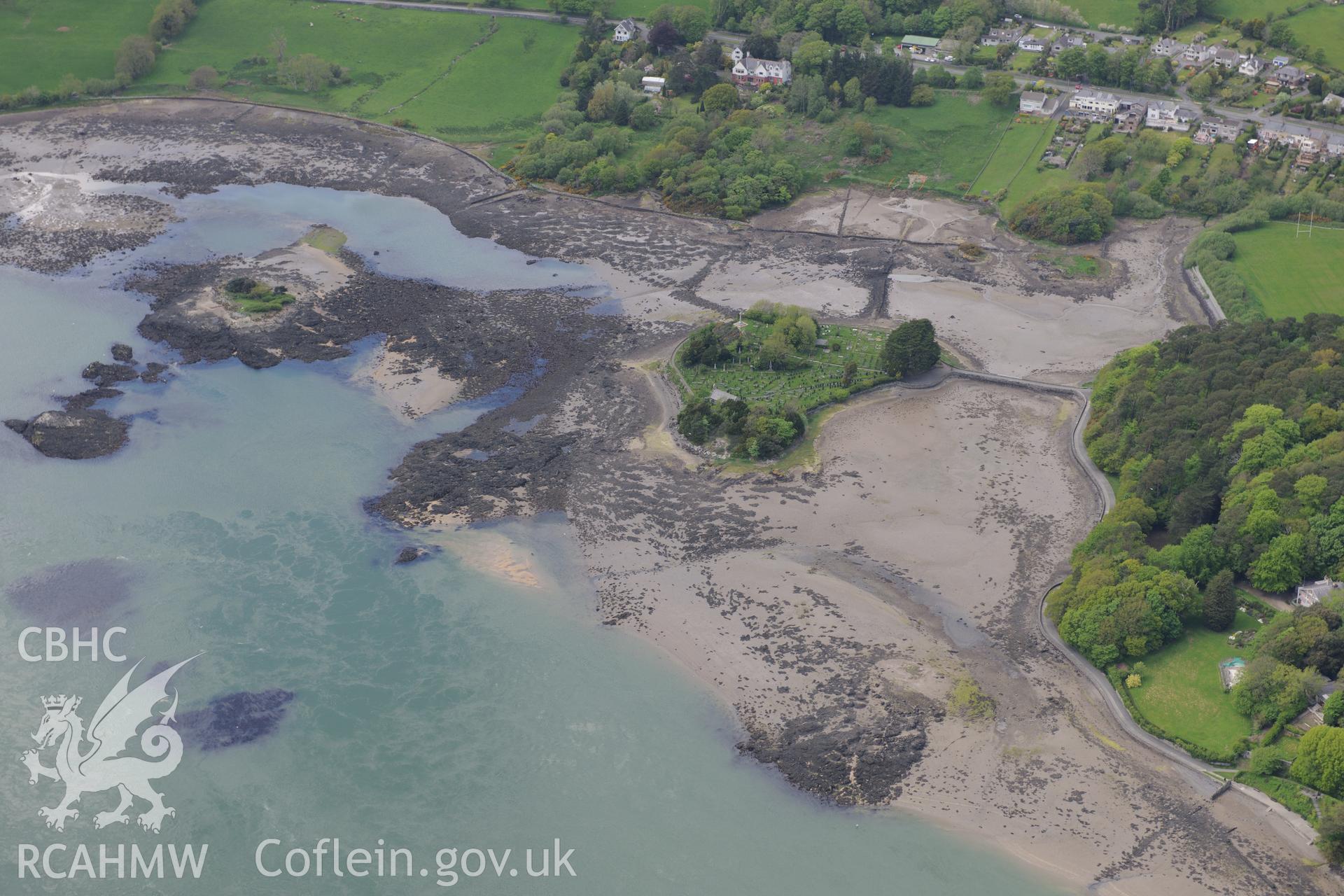St. Tysilio's church, Menai Bridge. Oblique aerial photograph taken during the Royal Commission?s programme of archaeological aerial reconnaissance by Toby Driver on 22nd May 2013.