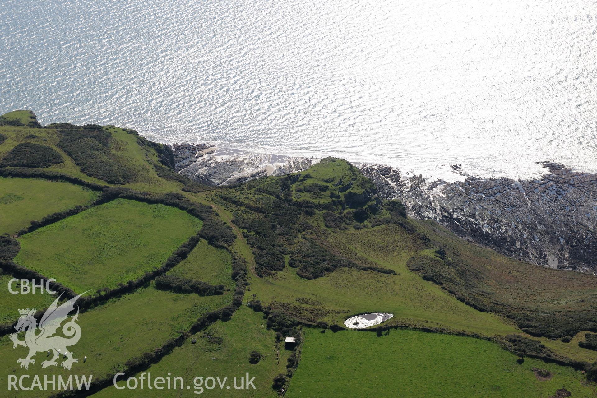High Pennard hillfort on Pwlldu Head cliffs, on the southern coast of the Gower Peninsula. Oblique aerial photograph taken during the Royal Commission's programme of archaeological aerial reconnaissance by Toby Driver on 30th September 2015.