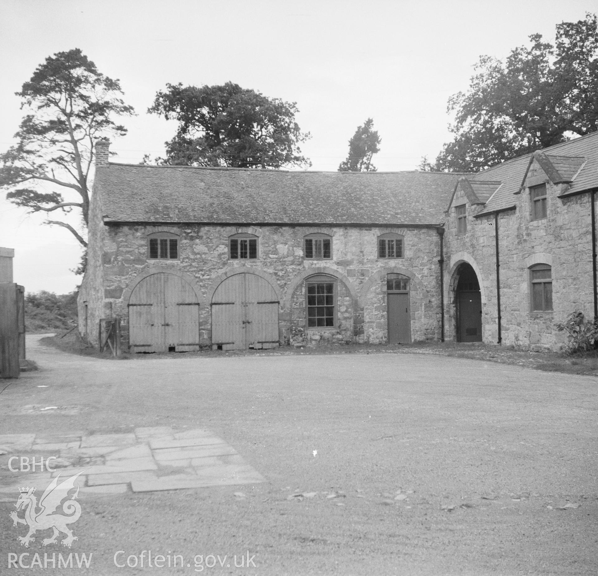 Digital copy of an undated nitrate negative showing view of outbuildings at Bodrhyddan Hall, Rhuddlan, Flintshire.