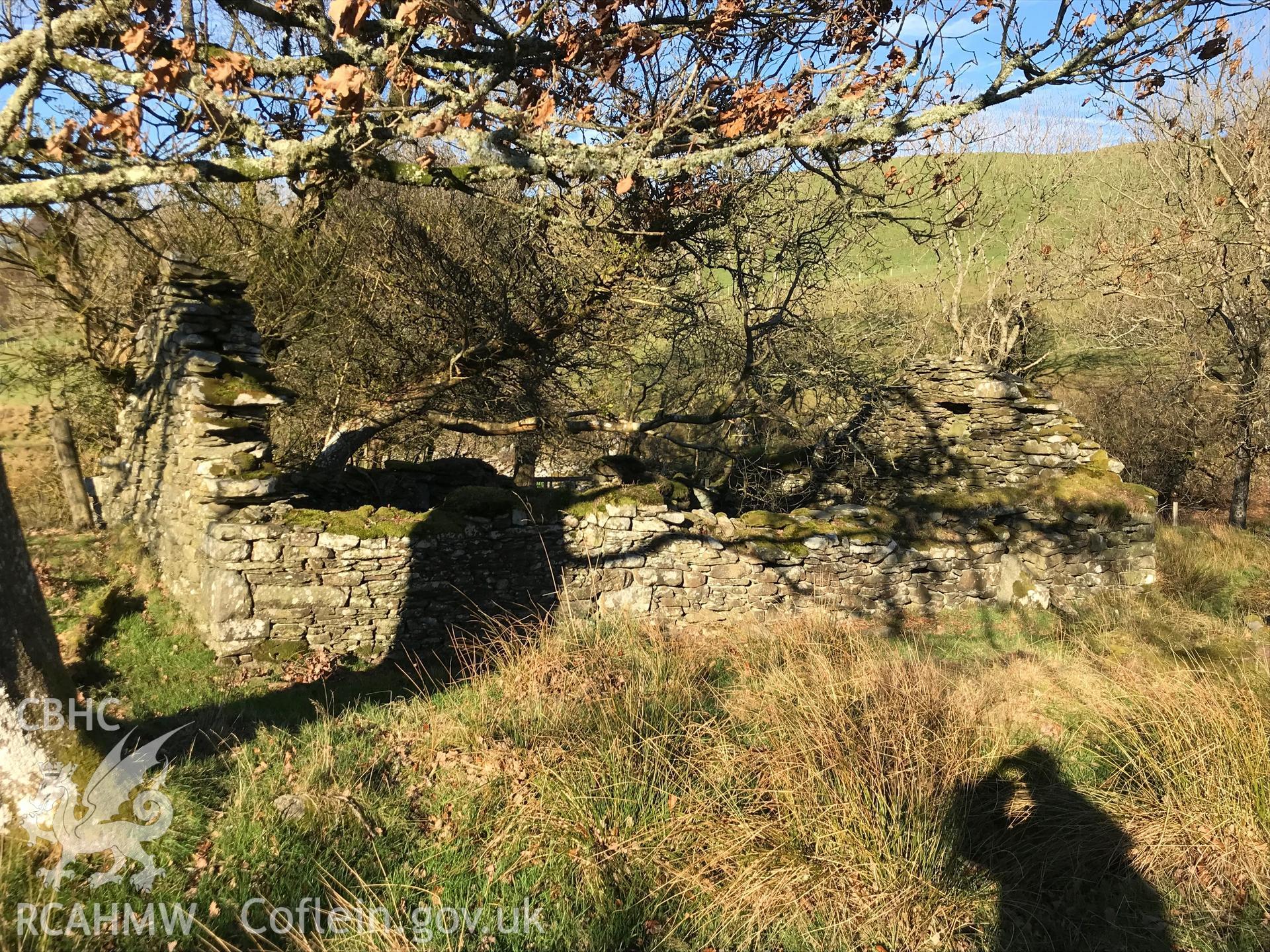 Exterior view of a stone cottage north west of the ruined Castell, which is south west of Bryneithinog farm, Ystrad Fflur. Colour photograph taken by Paul R. Davis on 18th November 2018.