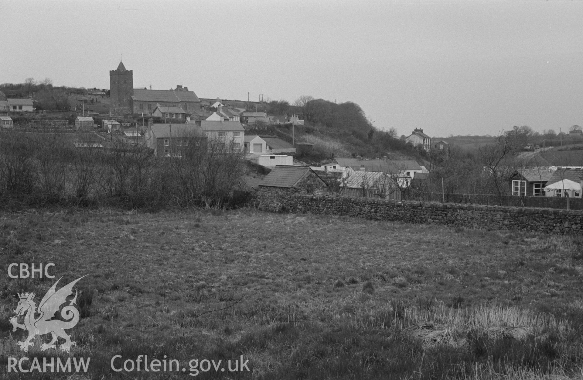Digital copy of a black and white negative showing view of Llanarth, including St David's church. Photographed by Arthur O. Chater on 13th April 1967 looking north east from just north east of Llanina Arms at Grid Reference SN 422 574.