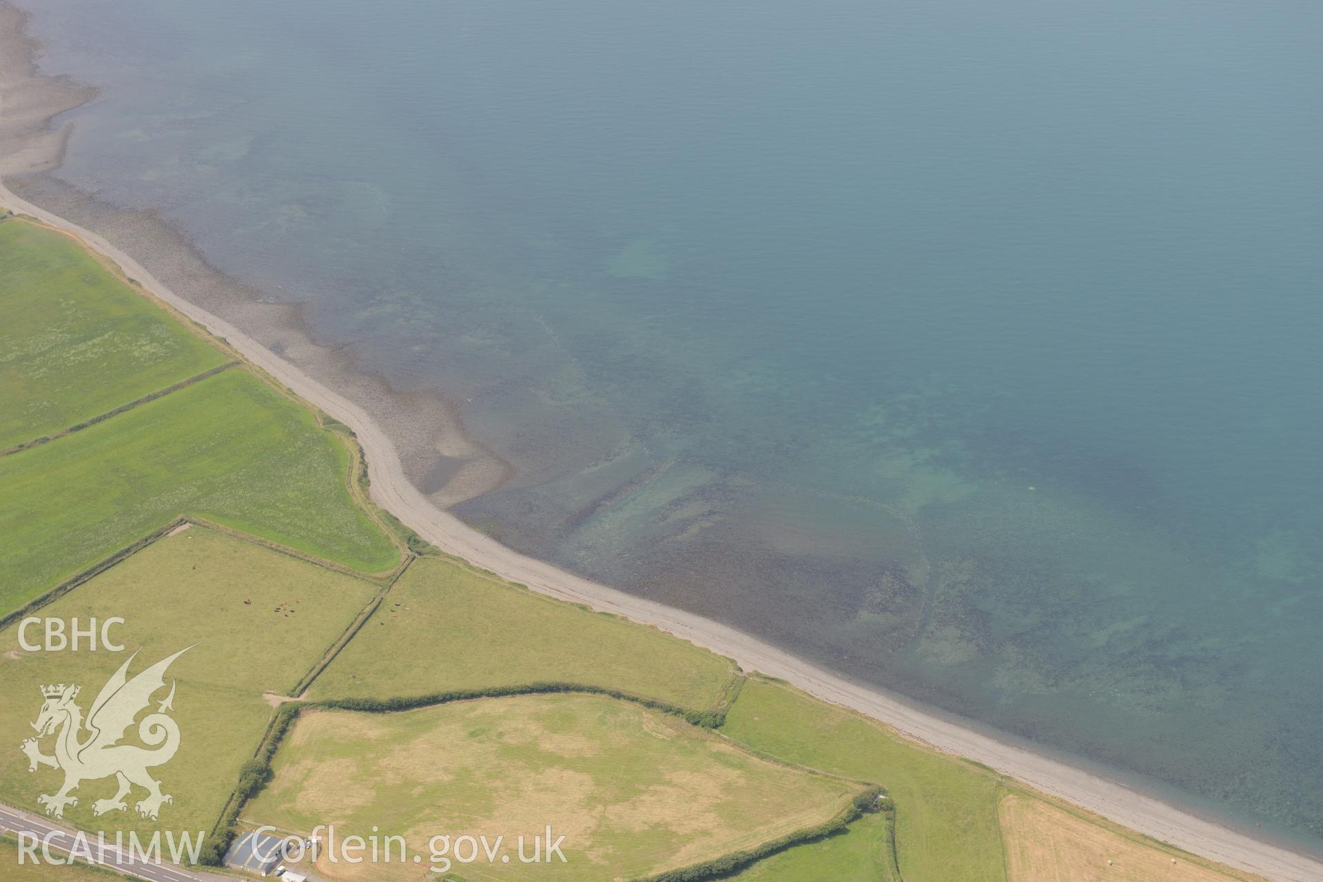 Aberarth fish trap complex. Oblique aerial photograph taken during the Royal Commission?s programme of archaeological aerial reconnaissance by Toby Driver on 12th July 2013.