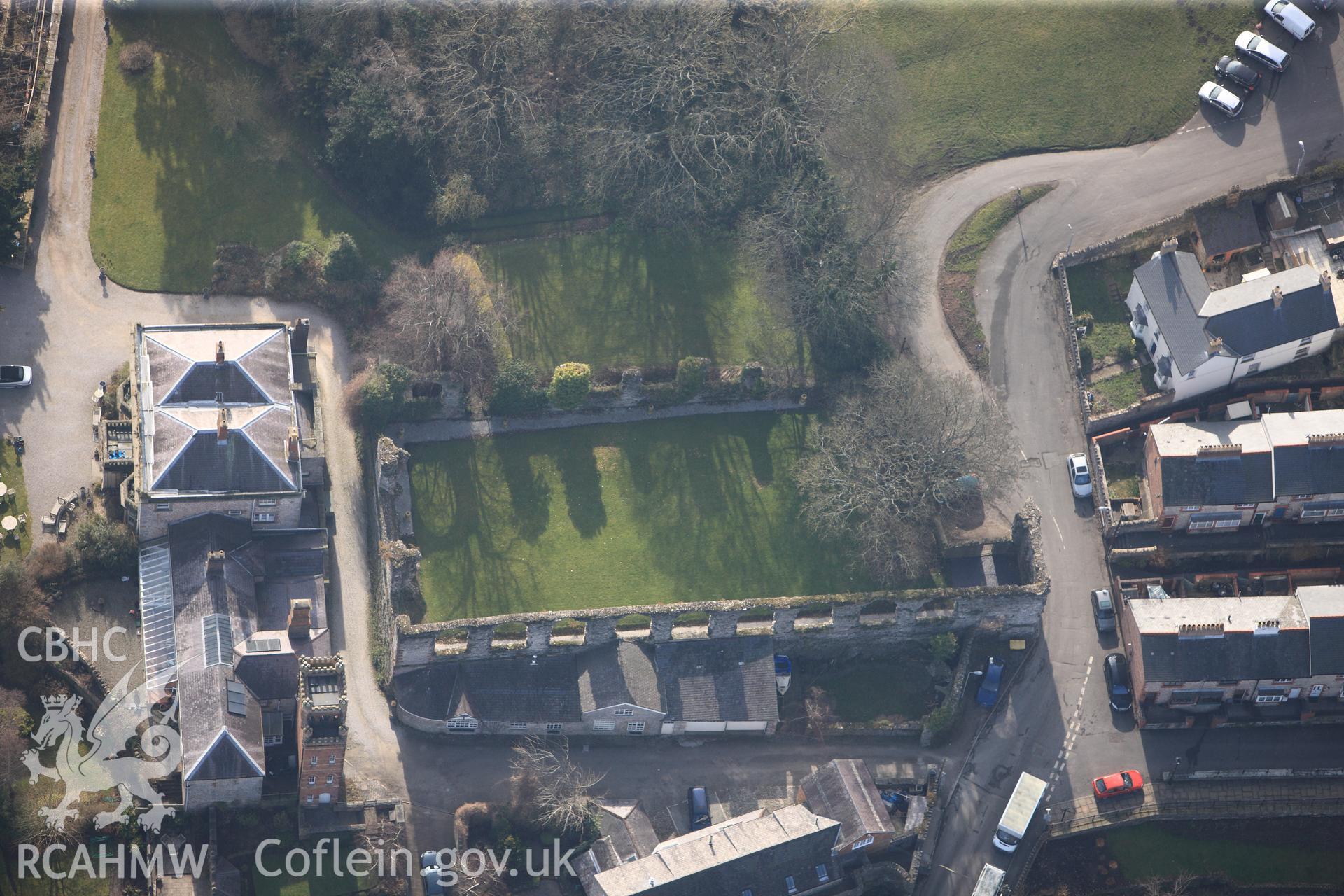 St. David's or Leicester's church  and Castle House, Denbigh. Oblique aerial photograph taken during the Royal Commission?s programme of archaeological aerial reconnaissance by Toby Driver on 28th February 2013.