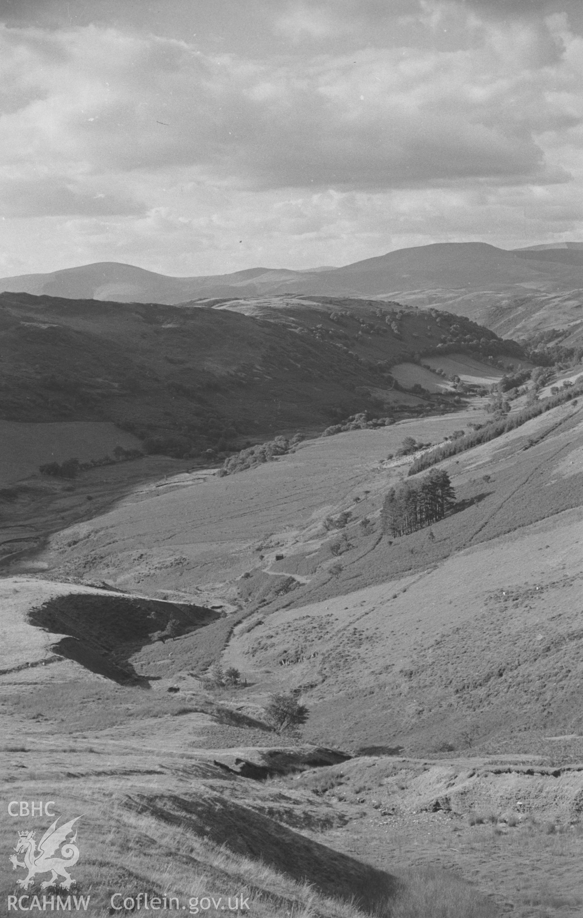 Digital copy of a black and white negative showing view down Cwm Rheidol from the old track on Llechwydd Melyn. Photographed by Arthur O. Chater in September 1965 looking north west from Grid Reference SN 7584 9448. (Panorama, 3 of 4 photographs).