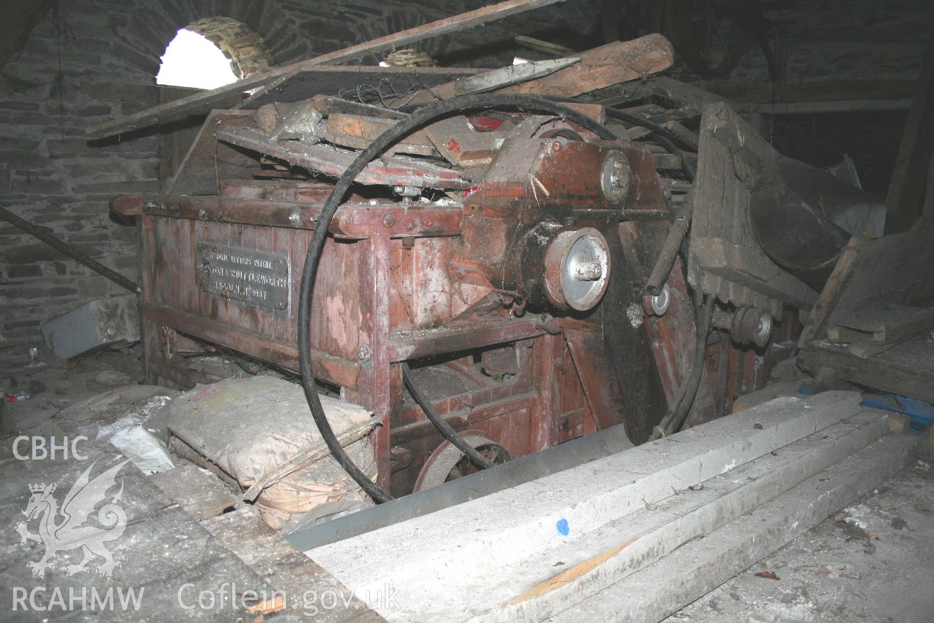 Interior view of threshing machine in threshing house. Photographic survey of the threshing machine in the threshing house at Tan-y-Graig Farm, Llanfarian. Conducted by Geoff Ward and John Wiles 11th December 2016.