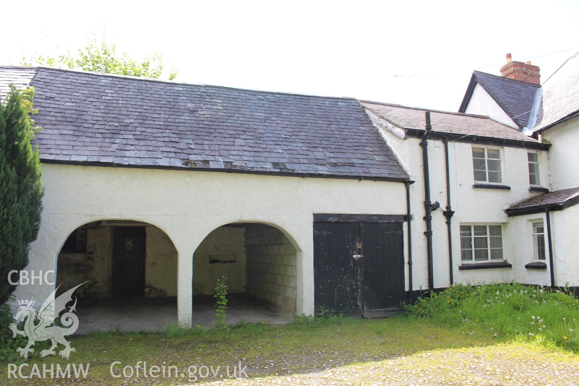 Colour photograph showing exterior view of outbuilding and rear of houses viewed from courtyard at rear of 5-7 Mwrog Street, Ruthin. Photographed during survey conducted by Geoff Ward on 14th May 2014.