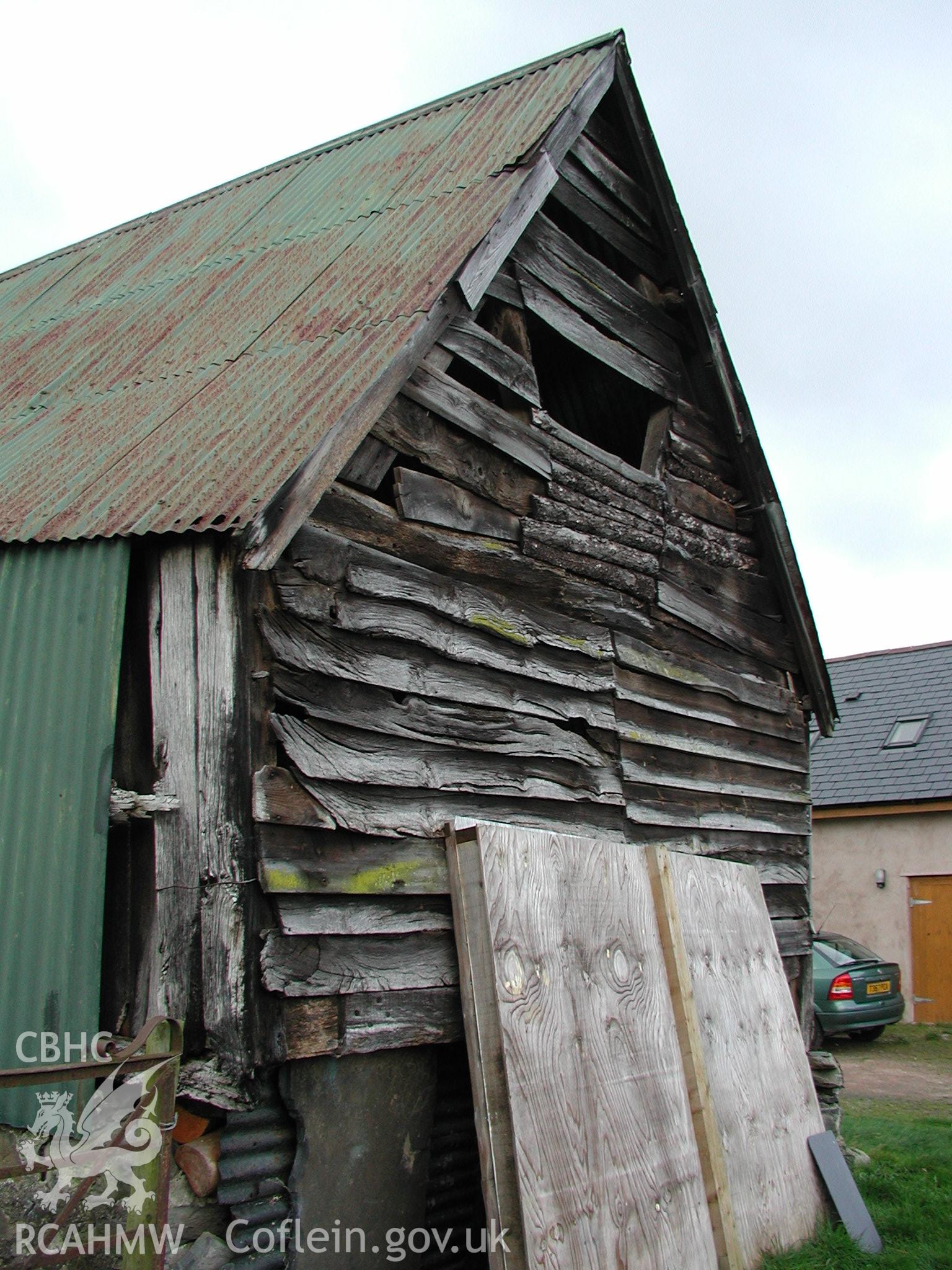 Exterior view of barn or shed with wooden panelling and corrugated iron roof at Pistyll Gwyn Farmstead. Photographic survey of Pistyll Gwyn Farmstead conducted by Geoff Ward on 13th November 2007.