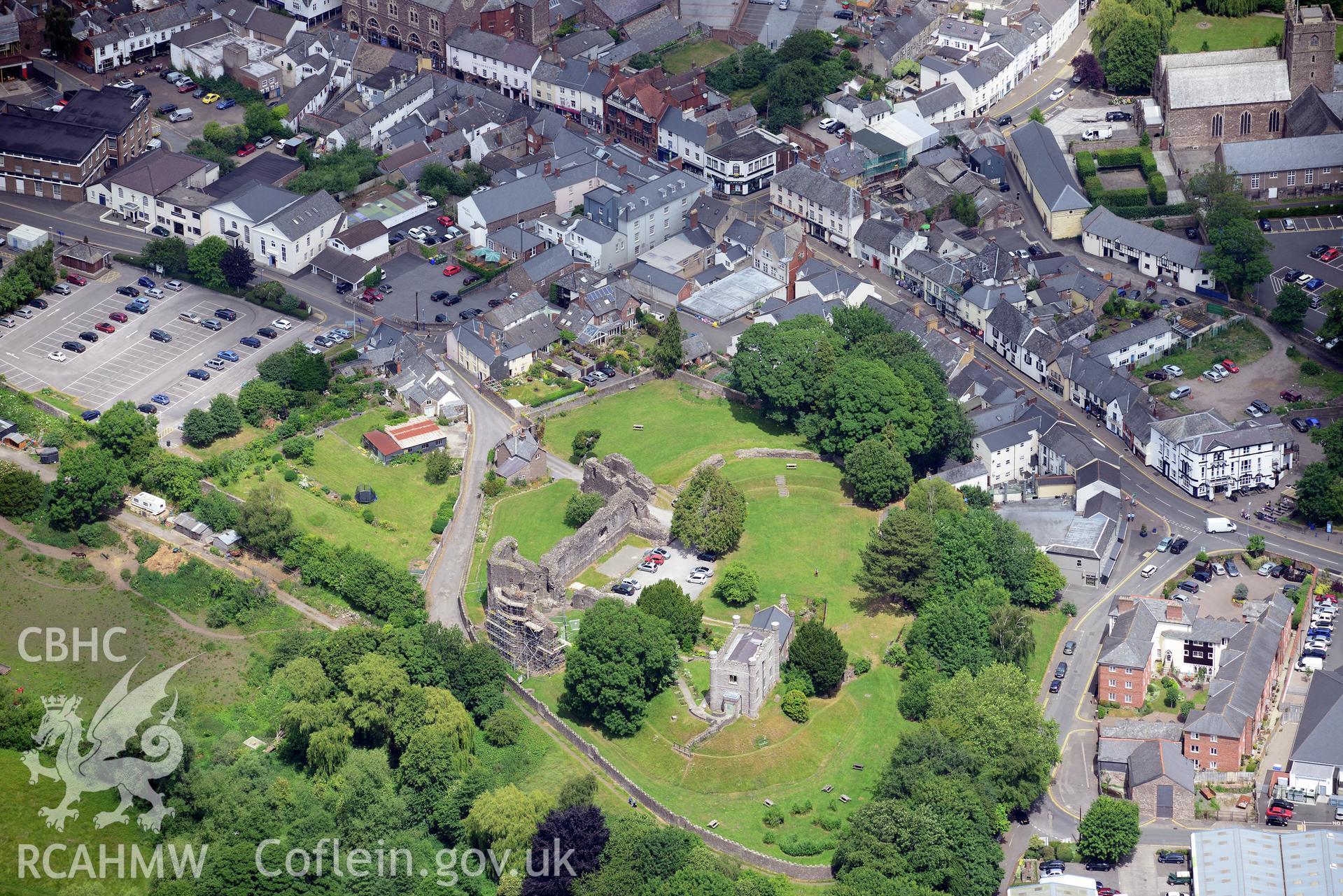 Abergavenny Castle, the castle garden, castle museum, and St. Mary's Church, Abergavenny. Oblique aerial photograph taken during the Royal Commission's programme of archaeological aerial reconnaissance by Toby Driver on 29th June 2015.