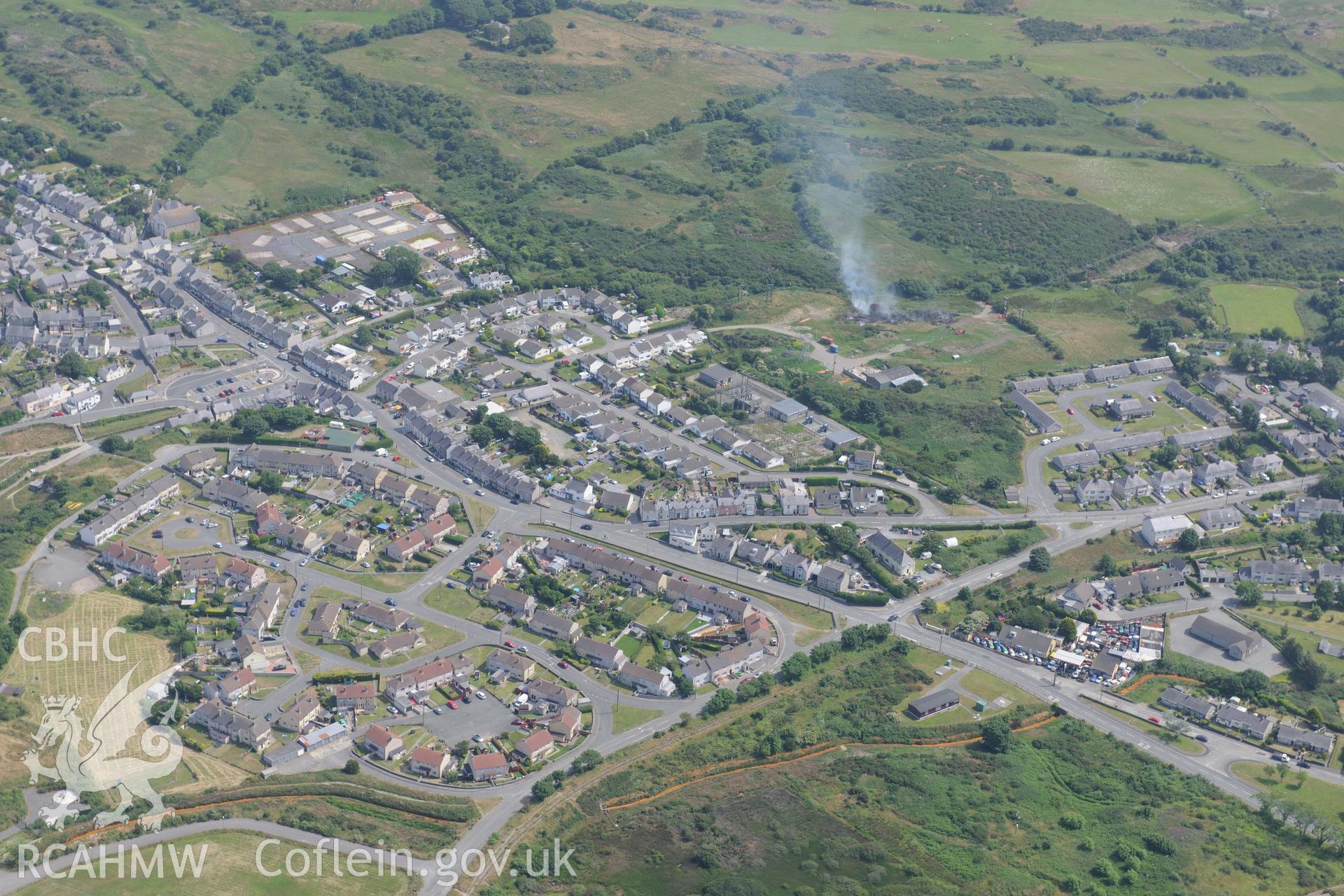 The village of Amlwch on Anglesey. Oblique aerial photograph taken during the Royal Commission?s programme of archaeological aerial reconnaissance by Toby Driver on 12th July 2013.