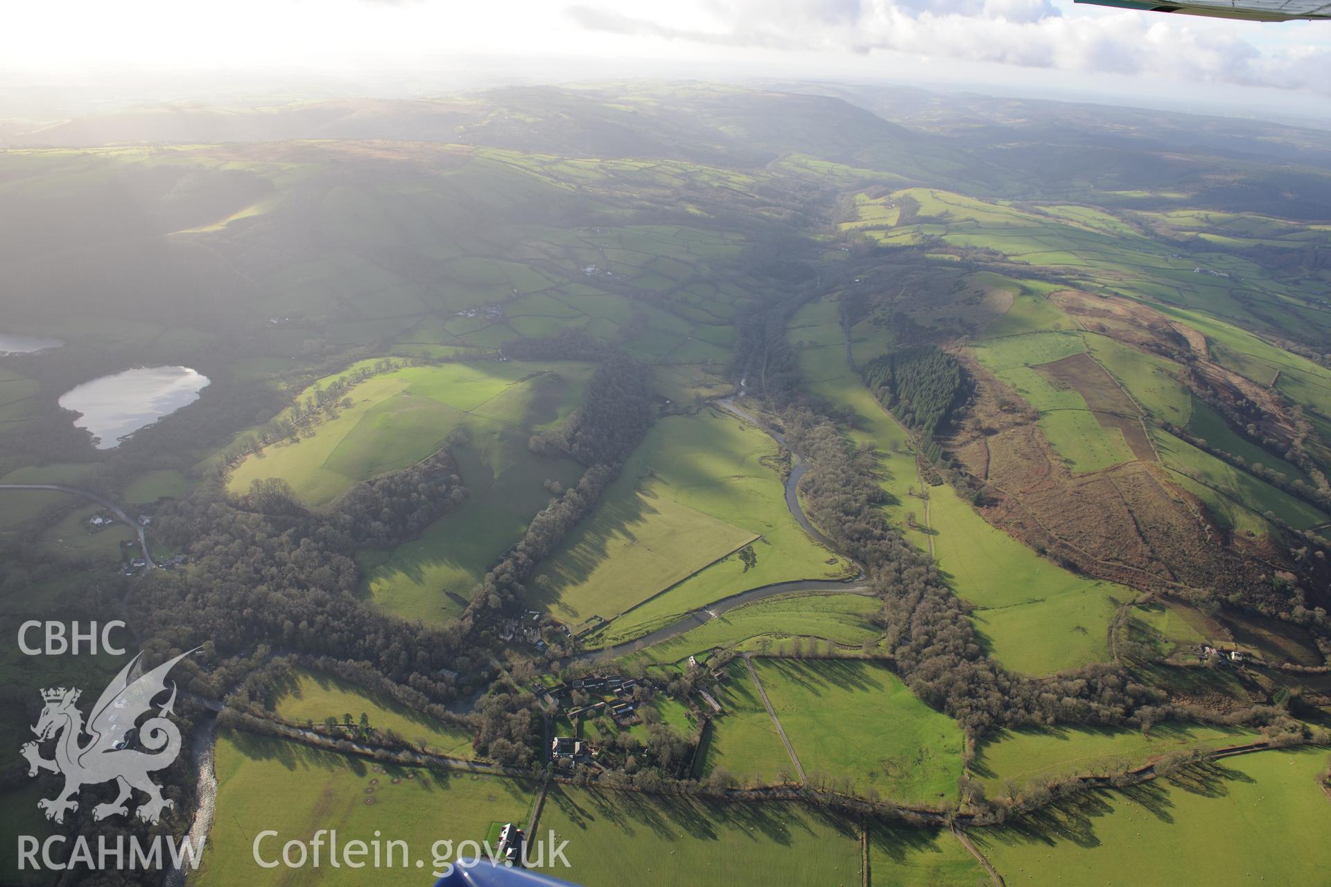 Edwinsford House and Garden, Home Farm, Coach House, Stables and unidentified outbuildings. Oblique aerial photograph taken during the Royal Commission's programme of archaeological aerial reconnaissance by Toby Driver on 6th January 2015.