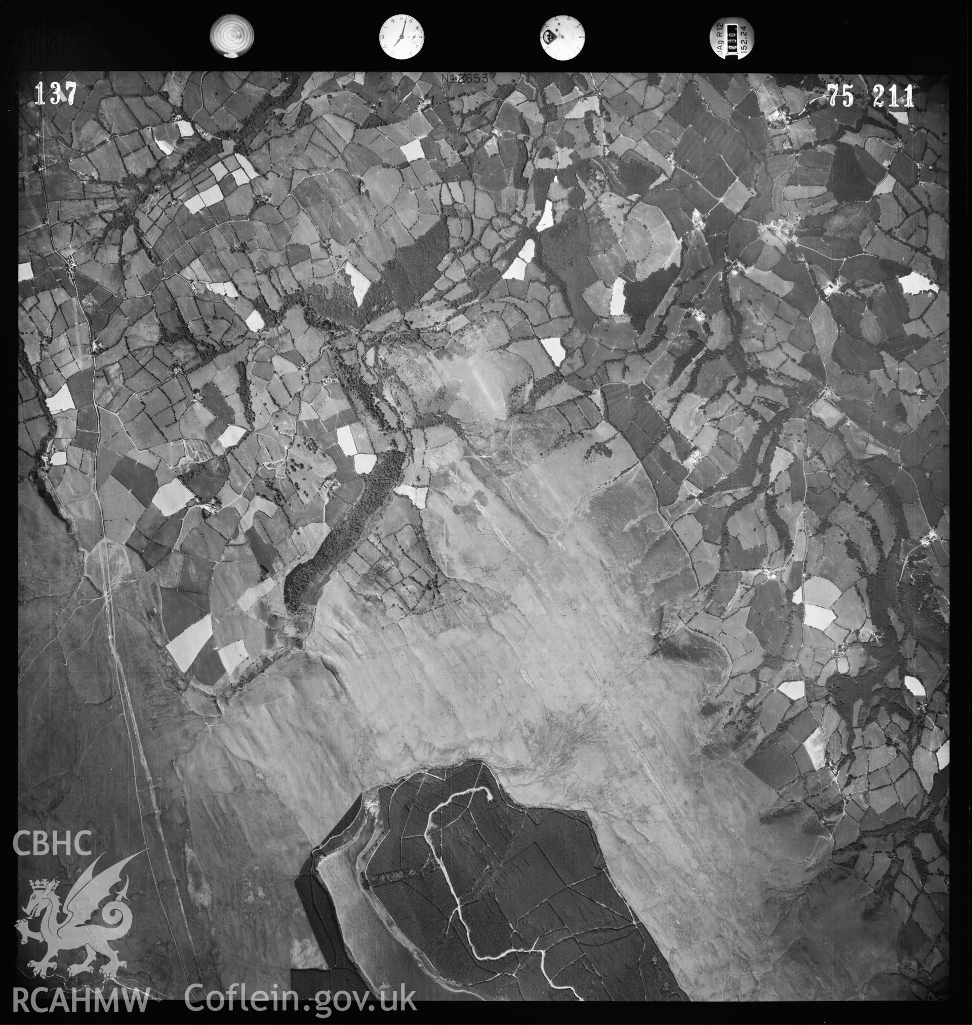 Digitized copy of an aerial photograph showing Rhyblid, Mynydd Myddfai, taken by Ordnance Survey, 1975.