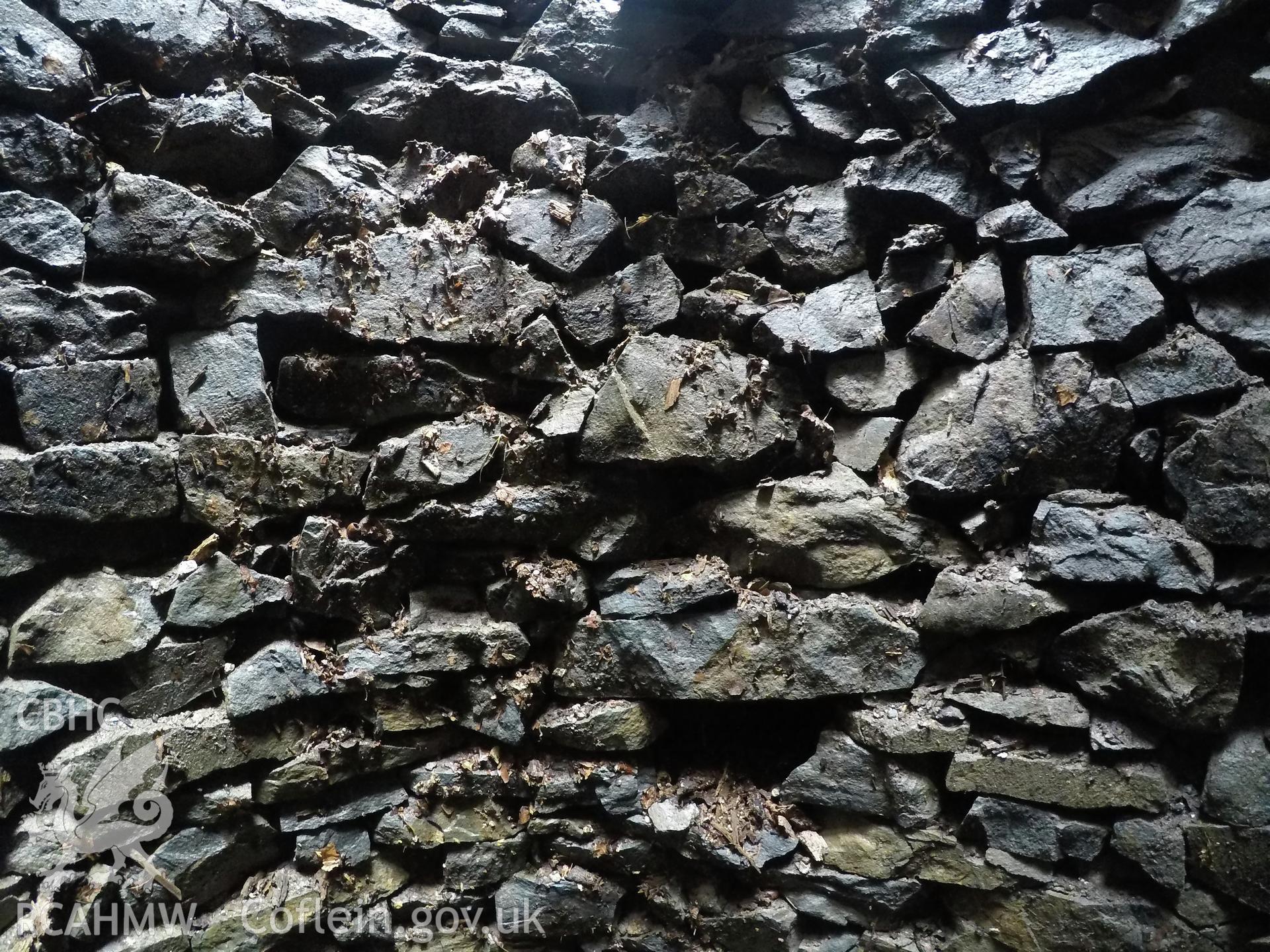 View from the north of well interior at 3.0m depth. Photographed by Gwynedd Archaeological Trust as part of archaeological mitigation report for well at Plas Celynin, Henryd, Conwy, on 1st August 2018. Project no. G2568.
