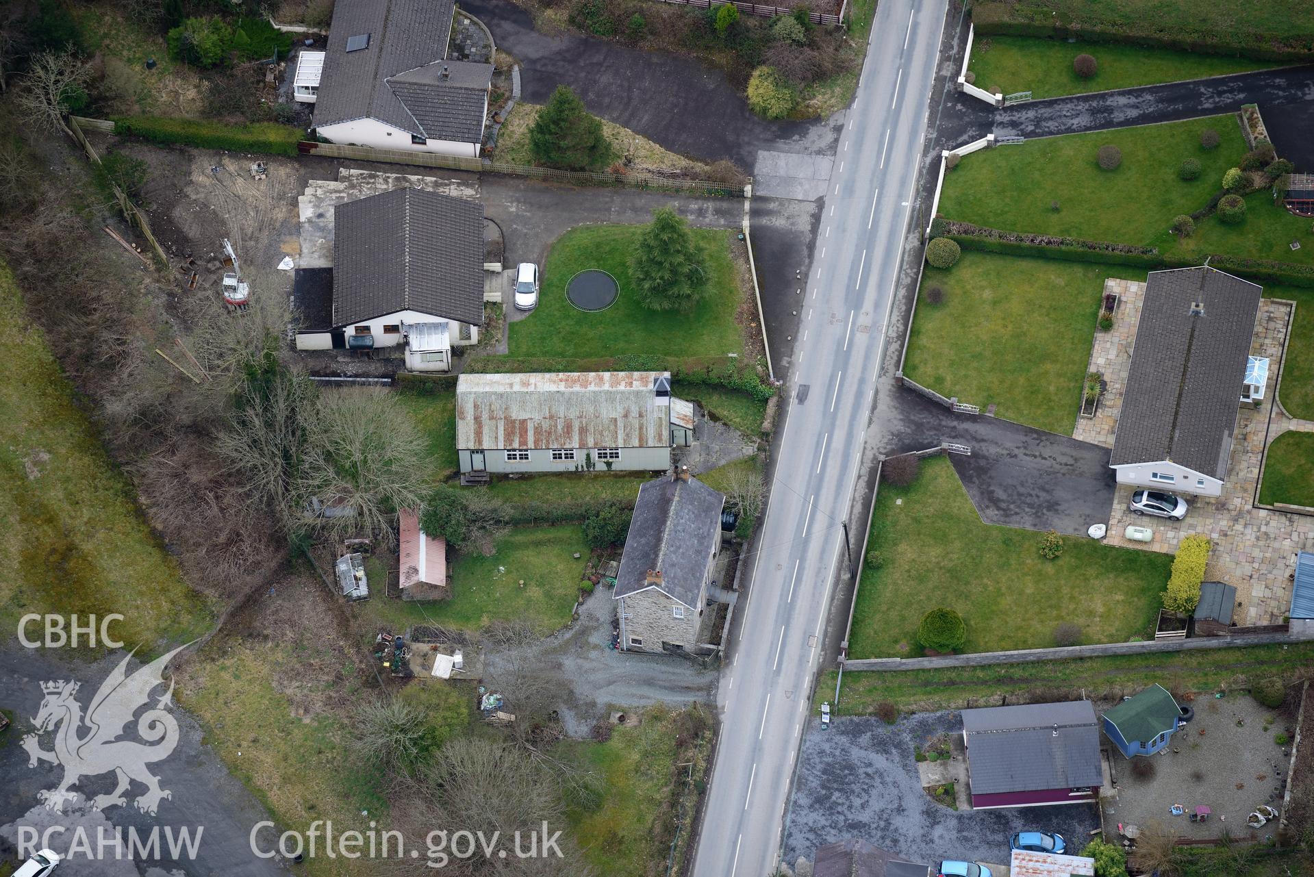 Henllan Bridge prisoner of war camp and the camp's Italian chapel, Henllan, near Llandysul. Oblique aerial photograph taken during the Royal Commission's programme of archaeological aerial reconnaissance by Toby Driver on 13th March 2015.