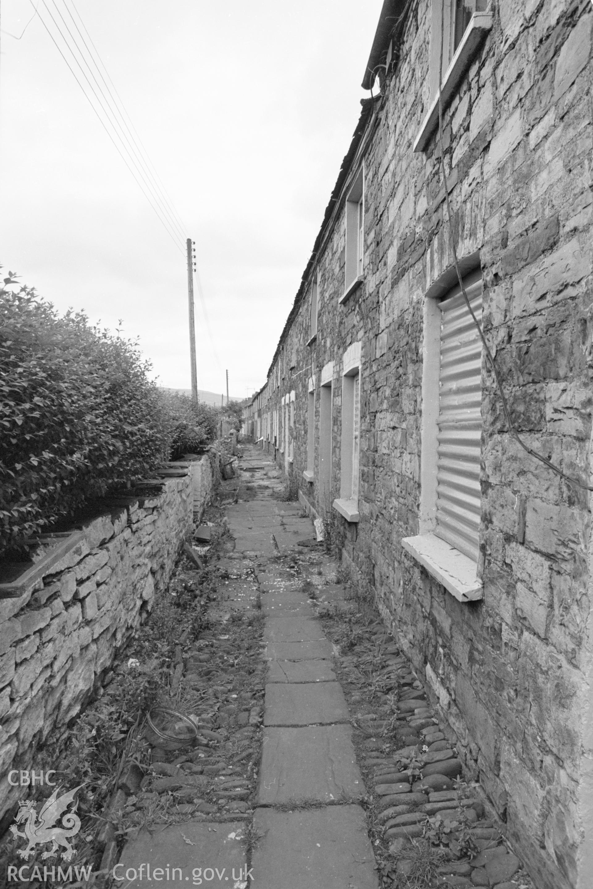 Digital copy of a main elevation view showing nos 19-20 Cyfarthfa Row, Merthyr Tydfil. taken by RCAHMW c1981.