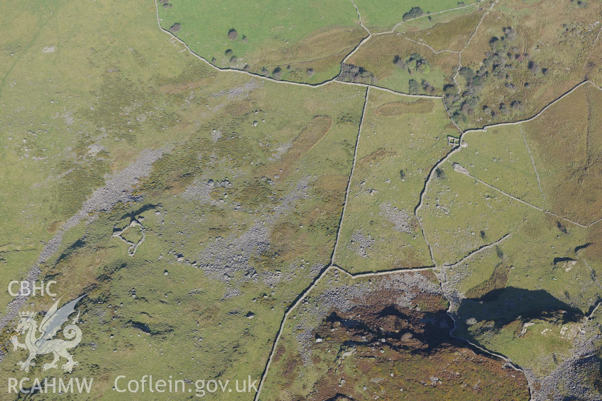 'D' shaped sheepfold and 'window' shaped sheepfold, south of Cwm Nantcol near Dyffryn Ardudwy. Oblique aerial photograph taken during the Royal Commission's programme of archaeological aerial reconnaissance by Toby Driver on 2nd October 2015.